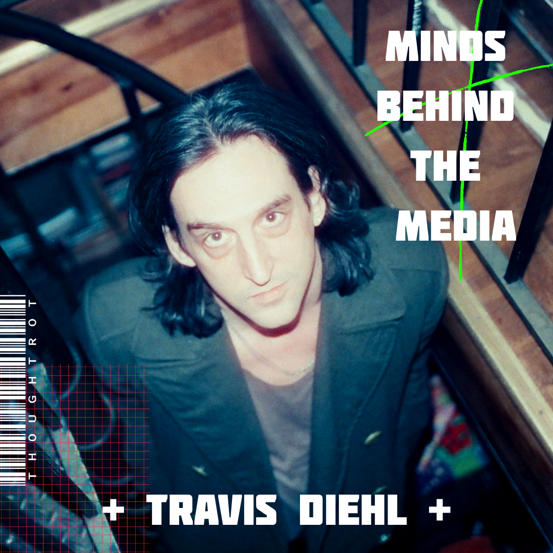 Top-down photo of Travis Diehl looking up at the camera, with text overlay that reads 'Minds Behind the Media' and his name.
