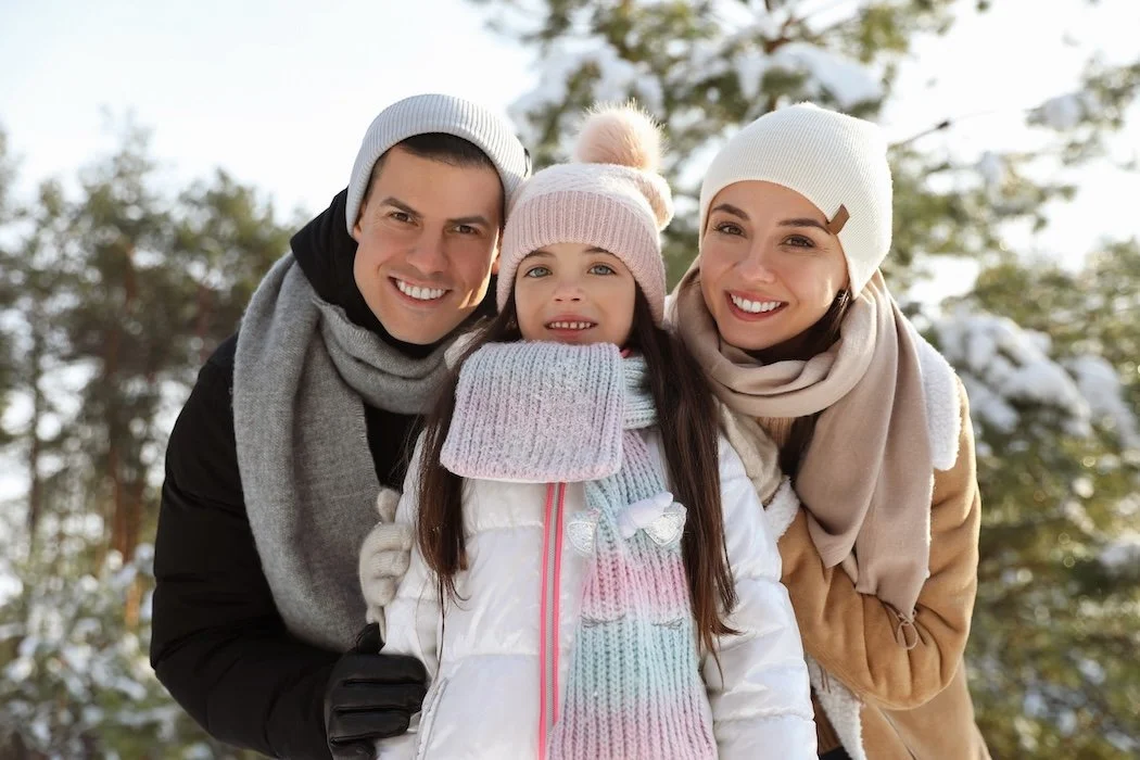 A healthy family in Denver in the snow.