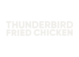 Text saying 'Thunderbird Fried Chicken' on a black background.
