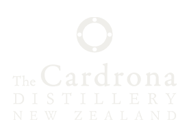 Logo of The Cardrona Distillery, New Zealand, featuring a keyhole design above the text.