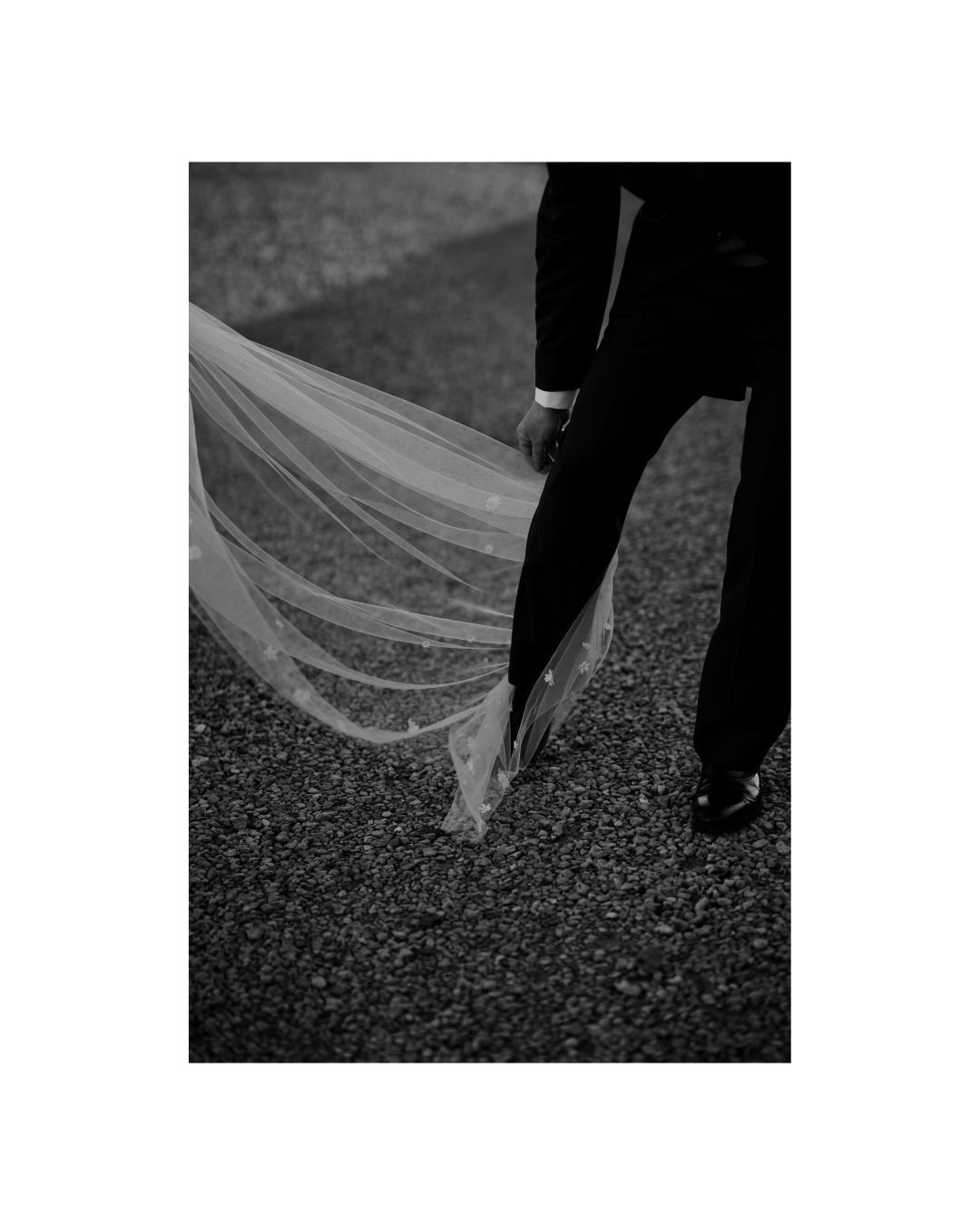 WIND⁠
.⁠
During Kelly and Tom's portrait session, nature decided to join in the fun, as Kelly's veil wrapped around Tom's leg. This spontaneous little moment did not go unnoticed and now adds a touch of humour to their gallery, while also serving as 