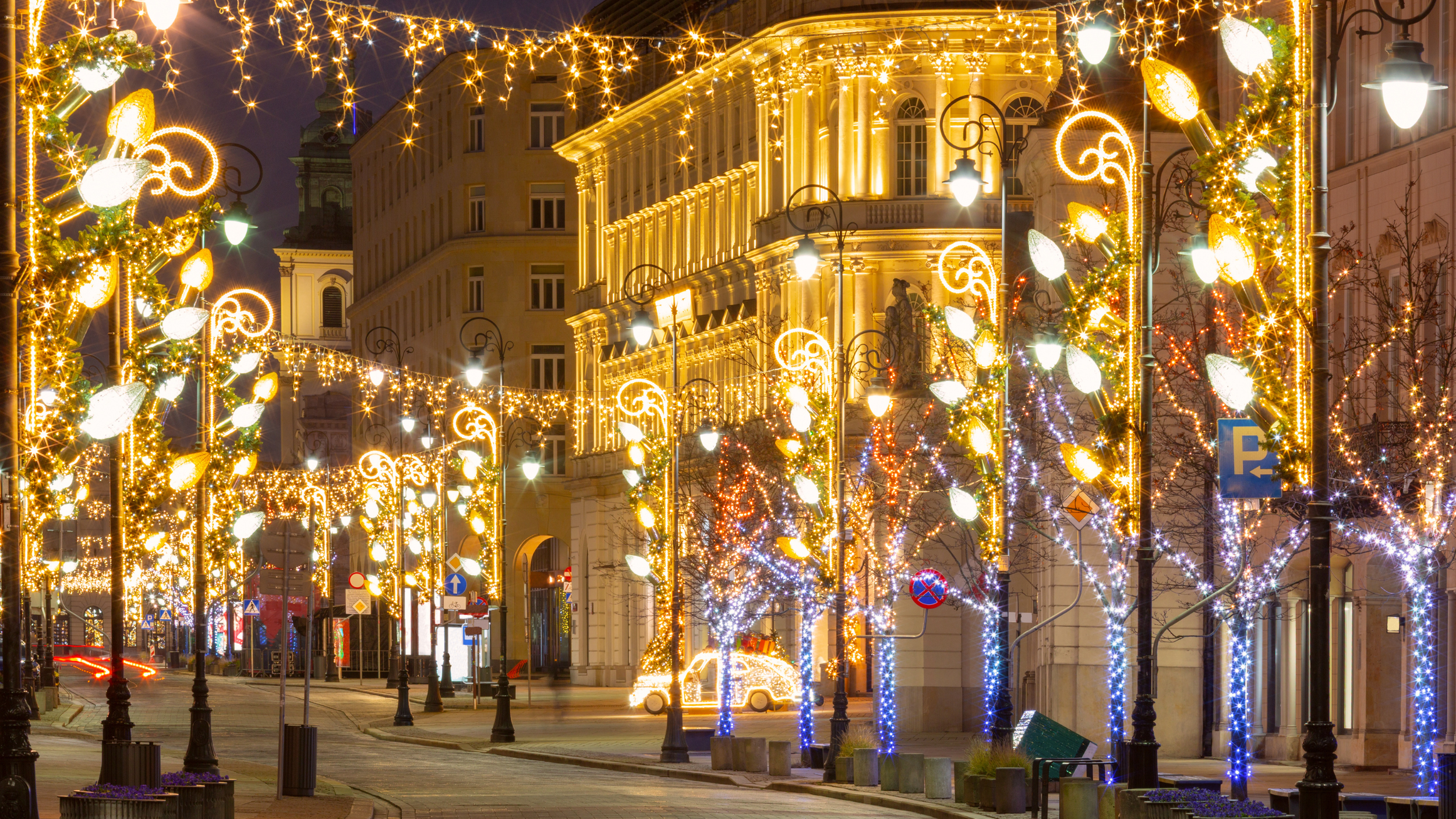 Christmas lights decorations on streets in Warsaw, Poland at night