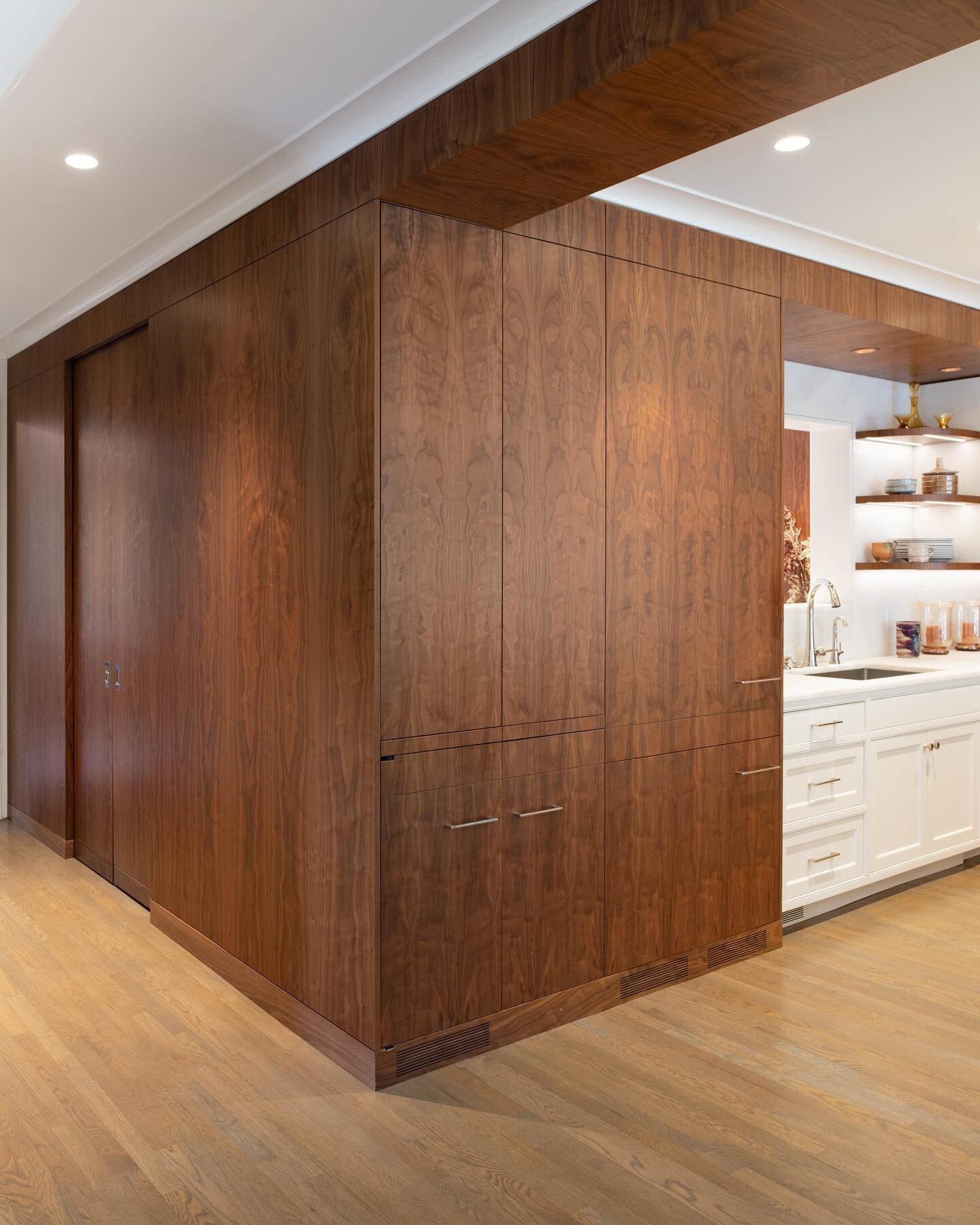 Refrigerator, Mini Bar, Ice Maker being concealed here with a custom pocket door going to the Pantry.  We laid up the veneer flitches in our vacuum bag to keep the grain sequence going on both sides of the door.
.
.
.
.
#craftsmanship #luxury #missio