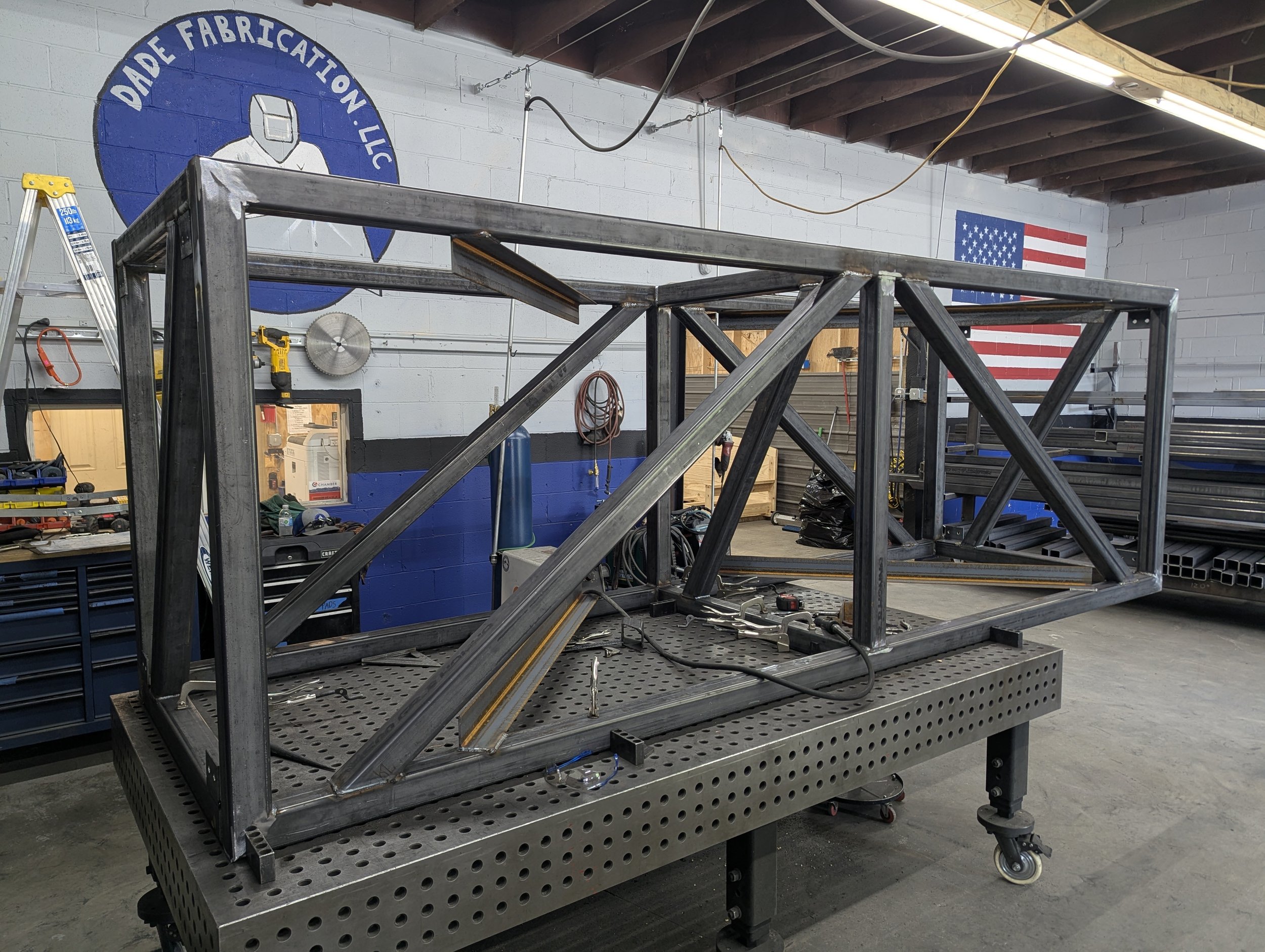 Welded steel truss frame on the fixture table in the Dade Fabrication shop