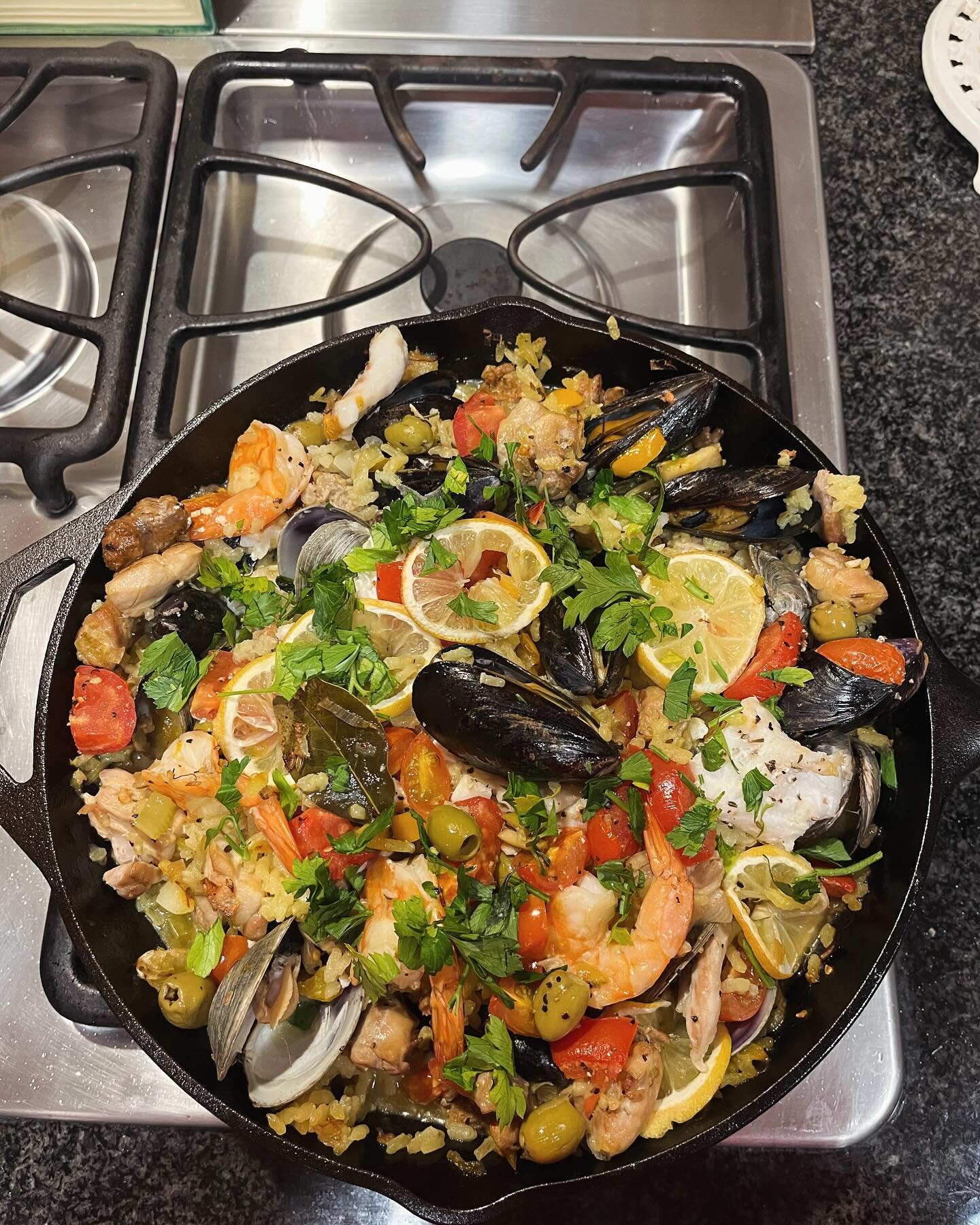 Paella is my go to dish for entertaining.  The house smells delicious also!