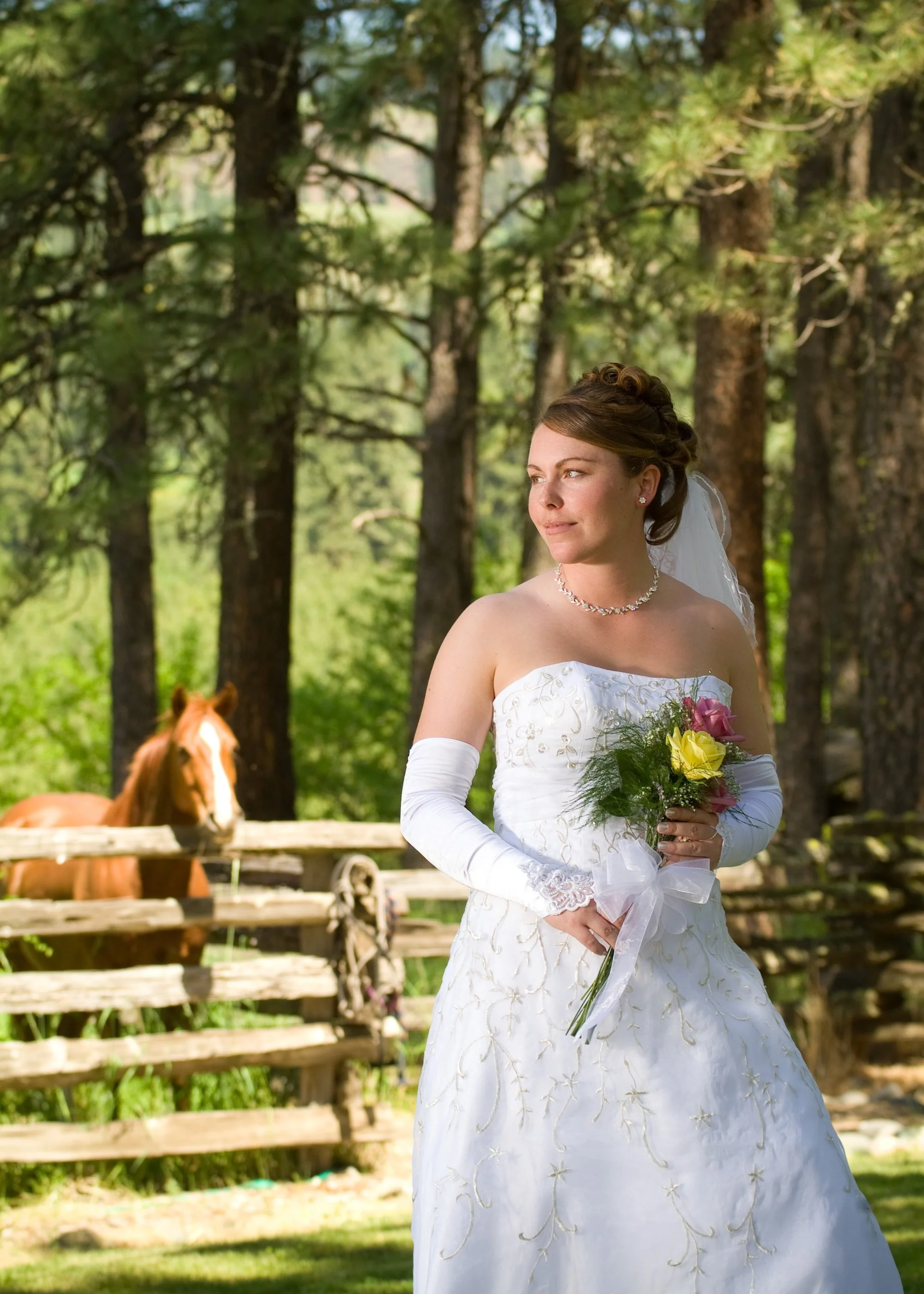 bride-holding-bouquet-outdoor-forest-idaho-wedding.jpeg
