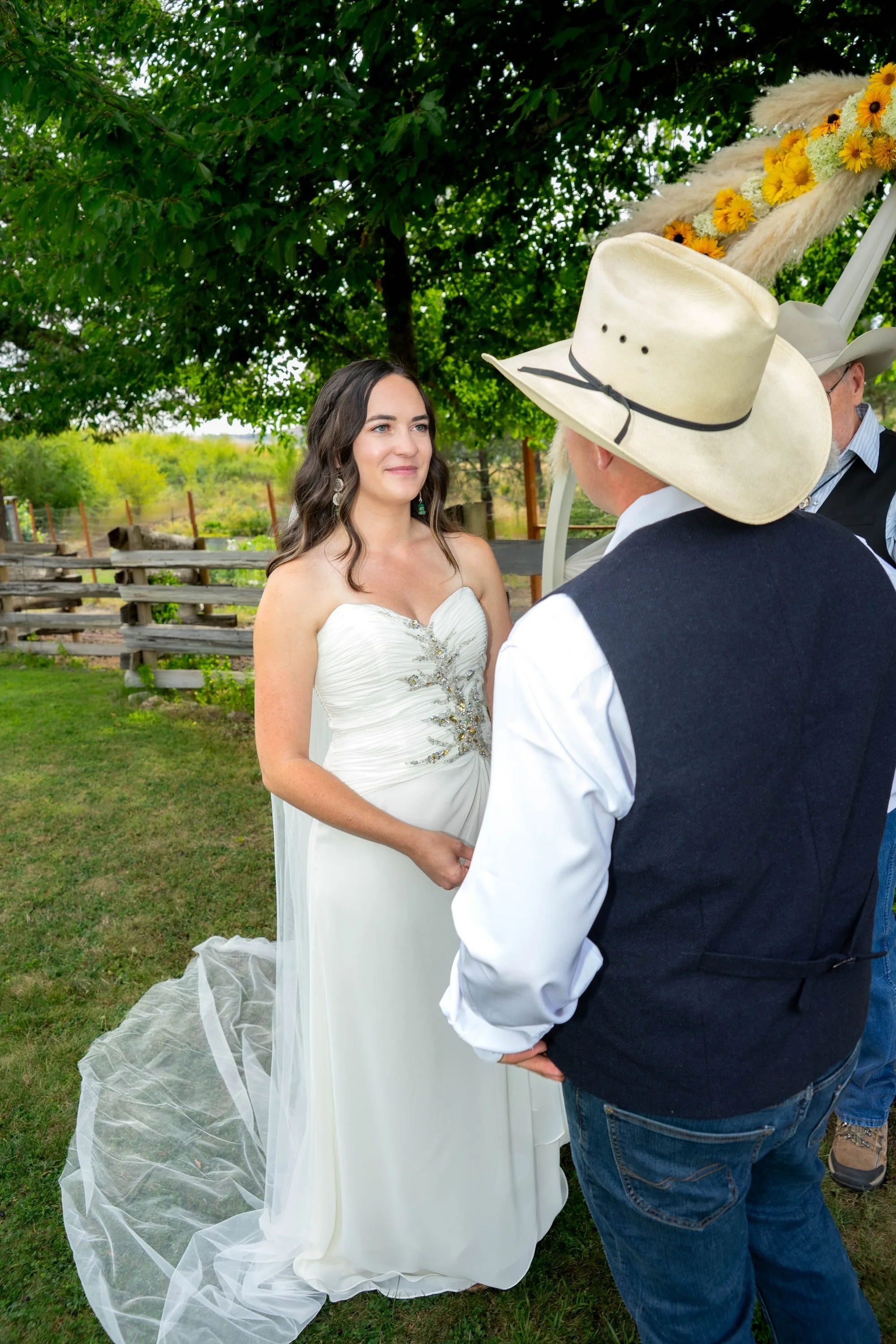 bride-and-groom-under-trees.jpeg