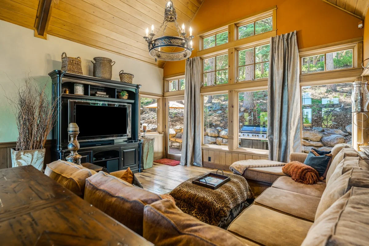 TV room with sectional & views at Gray Wolf Haven