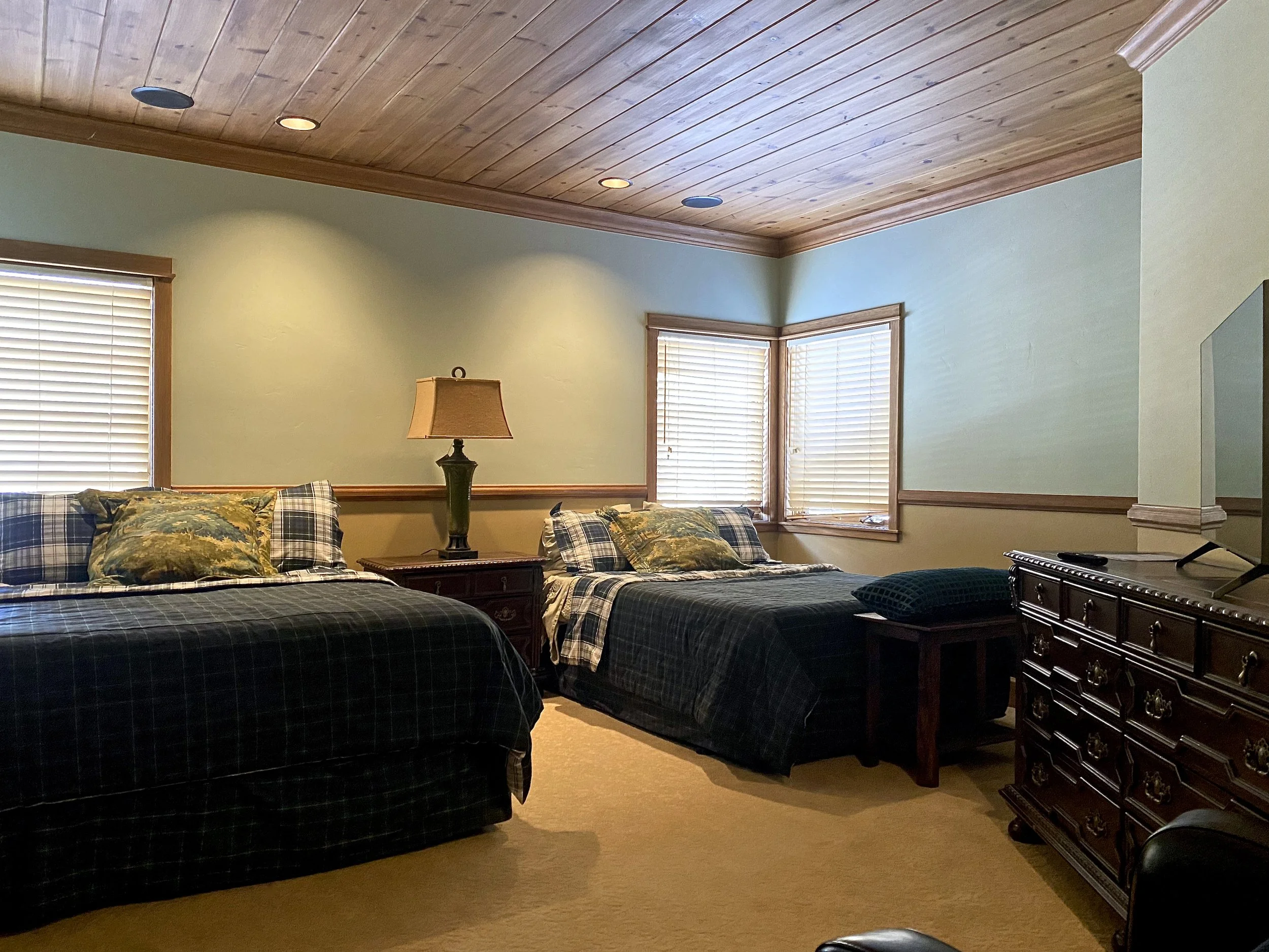 Bedroom with two queen beds at Gray Wolf Haven