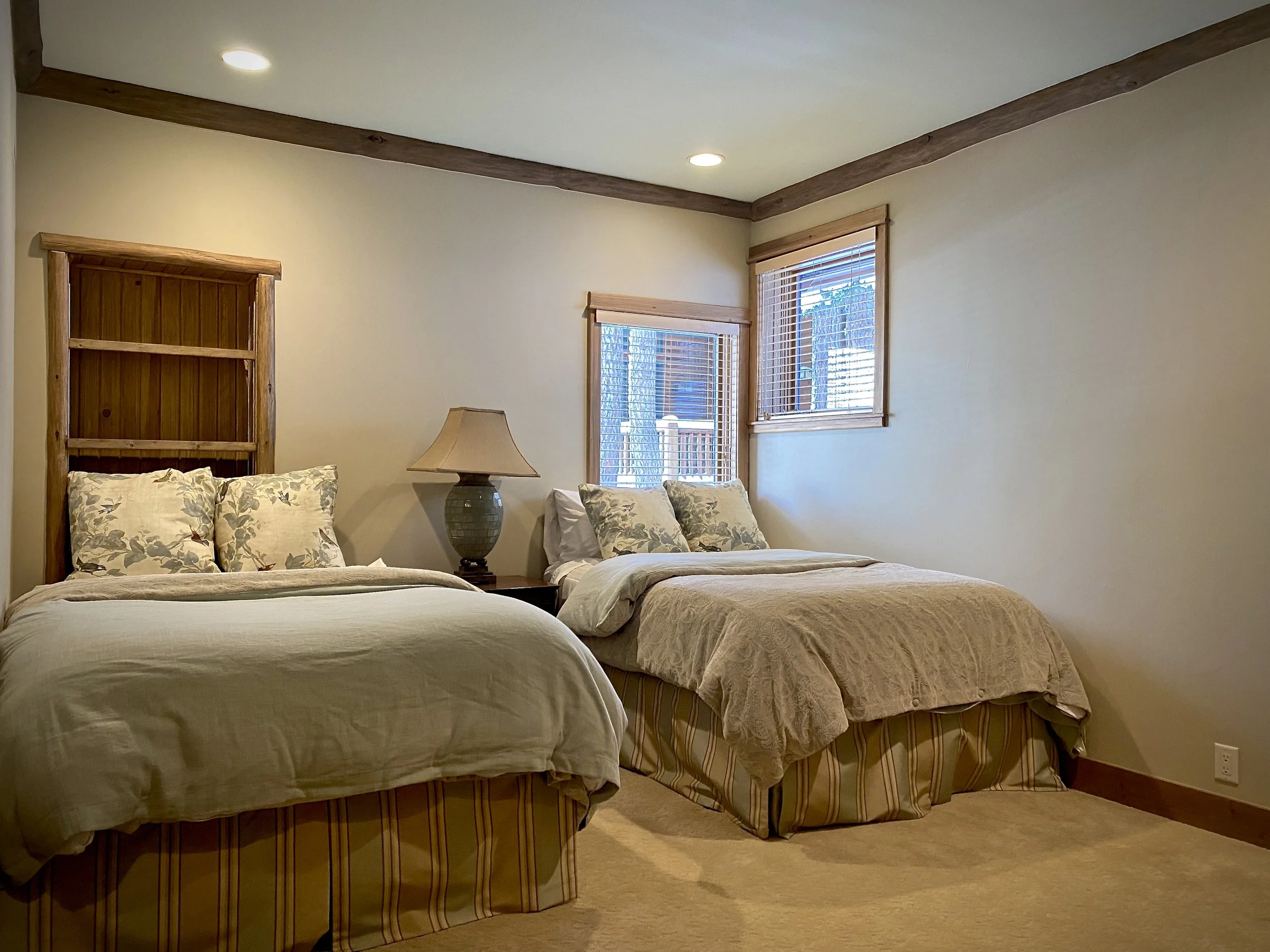 Bedroom with two full size beds at Gray Wolf Haven