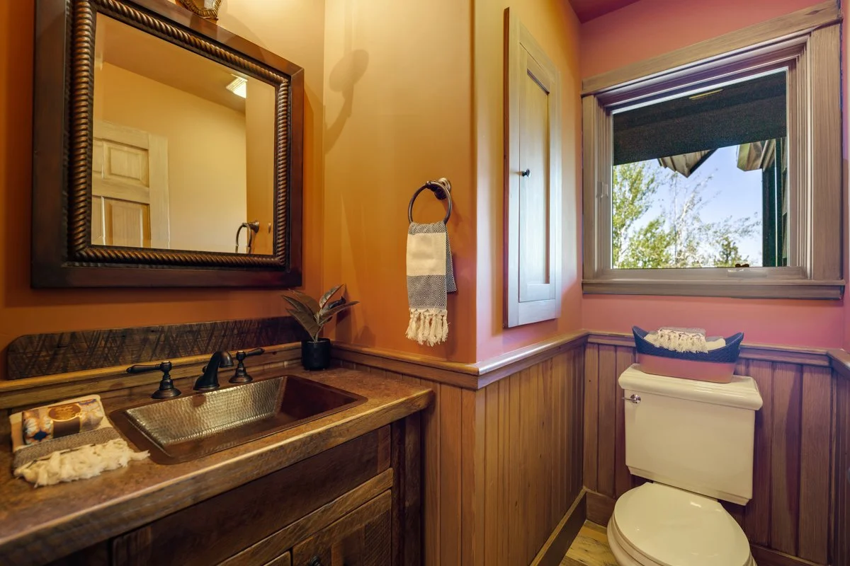 Rustic powder room at Gray Wolf Haven
