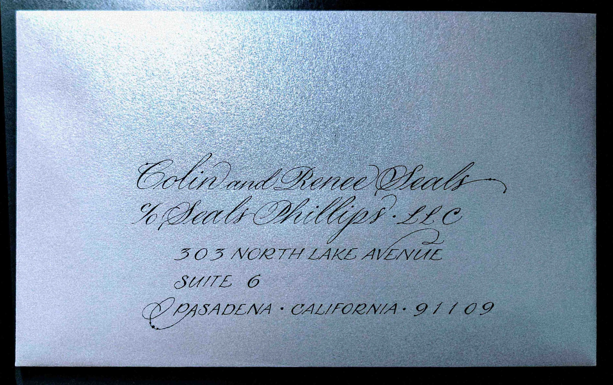 copperplate script on silver paper envelope copy.jpg