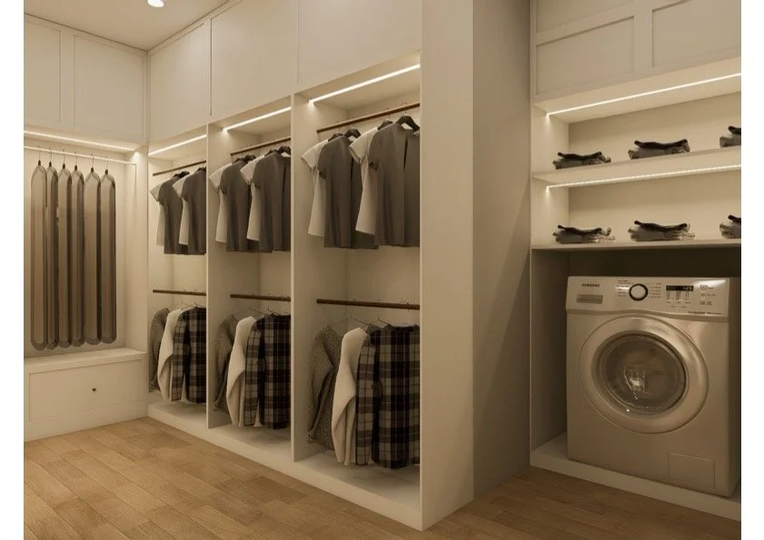 Clothing closet with hanging shirts, folded clothes, and a washer with shelves above.