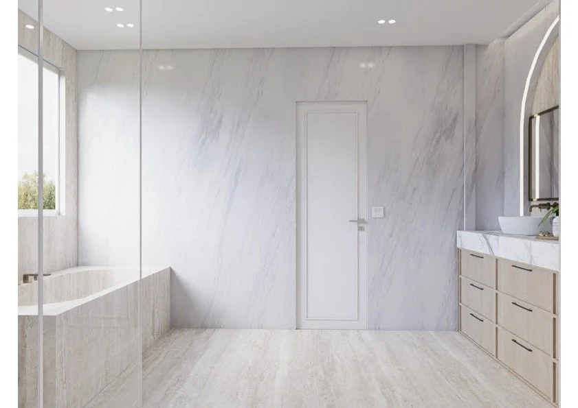 Minimalist bathroom with marble walls and floor, a built-in bathtub, a window letting in natural light, and a vanity with a vessel sink and storage drawers.