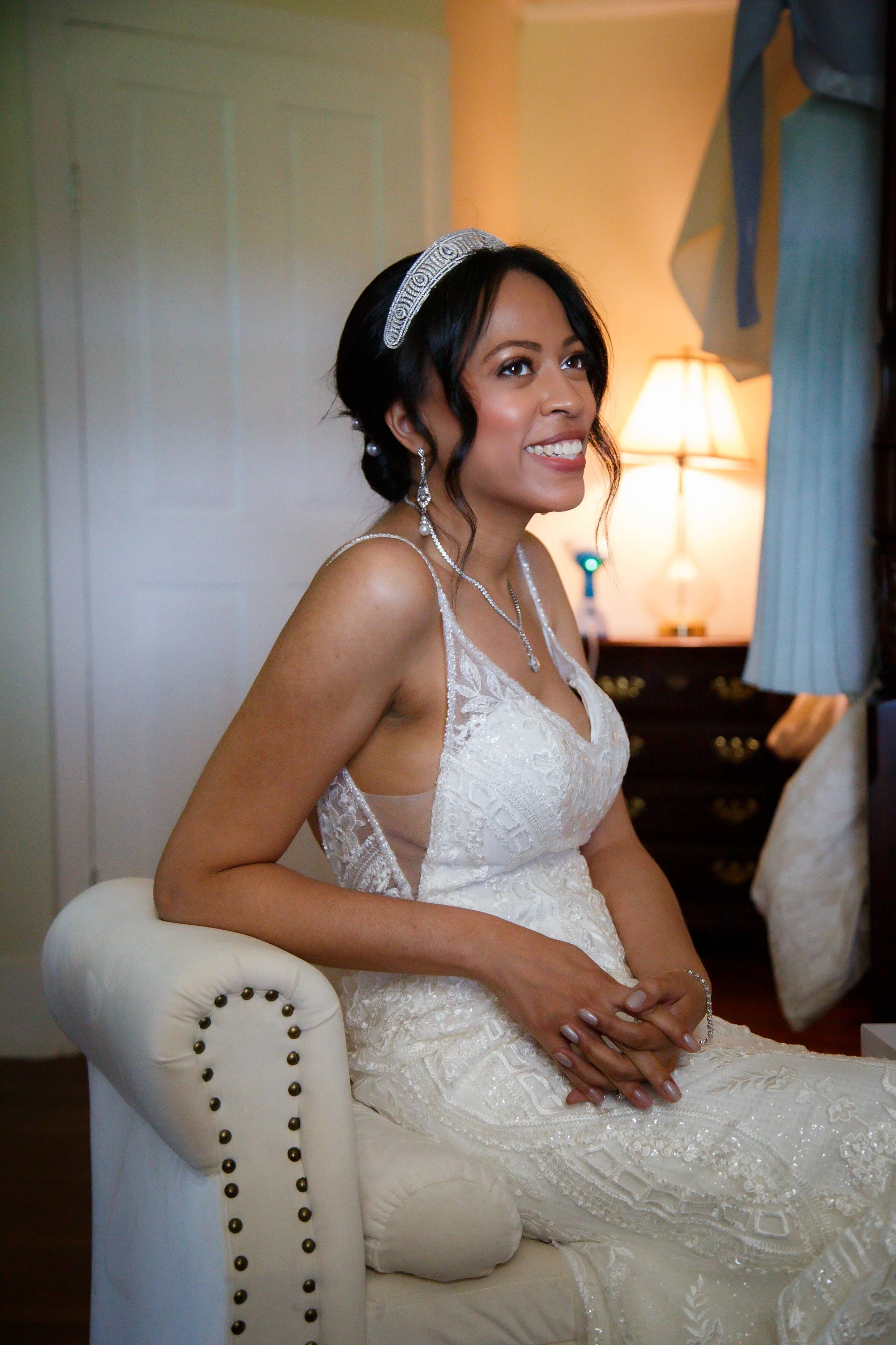 Elegant bride in beaded lace wedding gown with pearl headband, timeless bridal updo and natural bridal makeup, photographed by Briarley Images