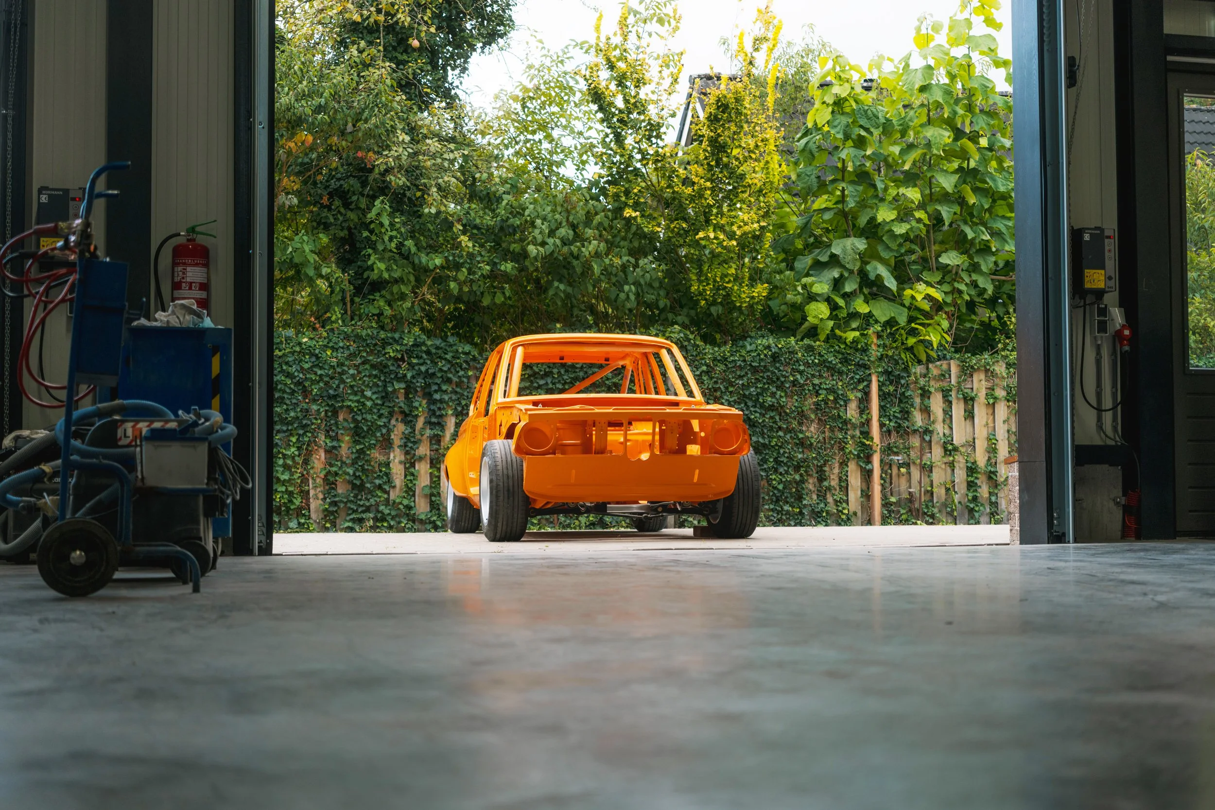 Eindresultaat gespoten BWM bij Garage van Beek.