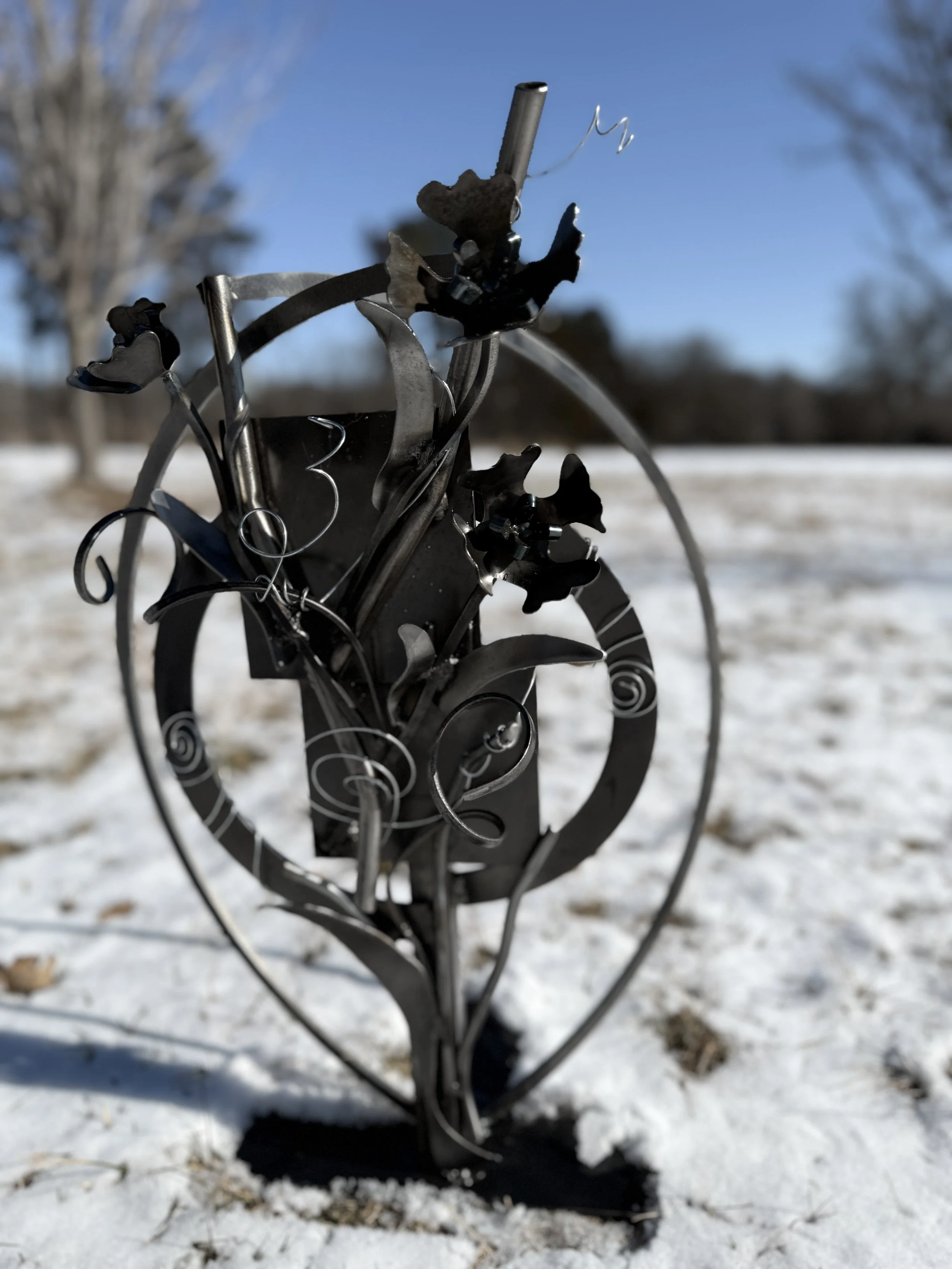 Custom mixed metal sculpture by Sally Jurgensmier.