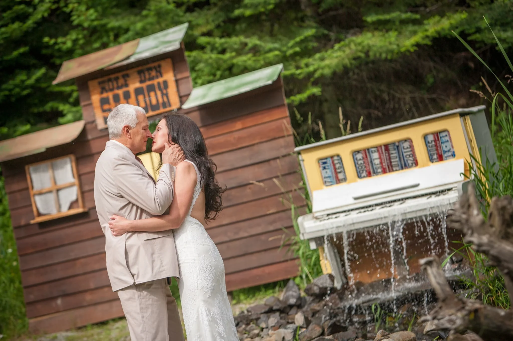 Looking into each other’s eyes next to the piano water feature which is so great for wedding photos