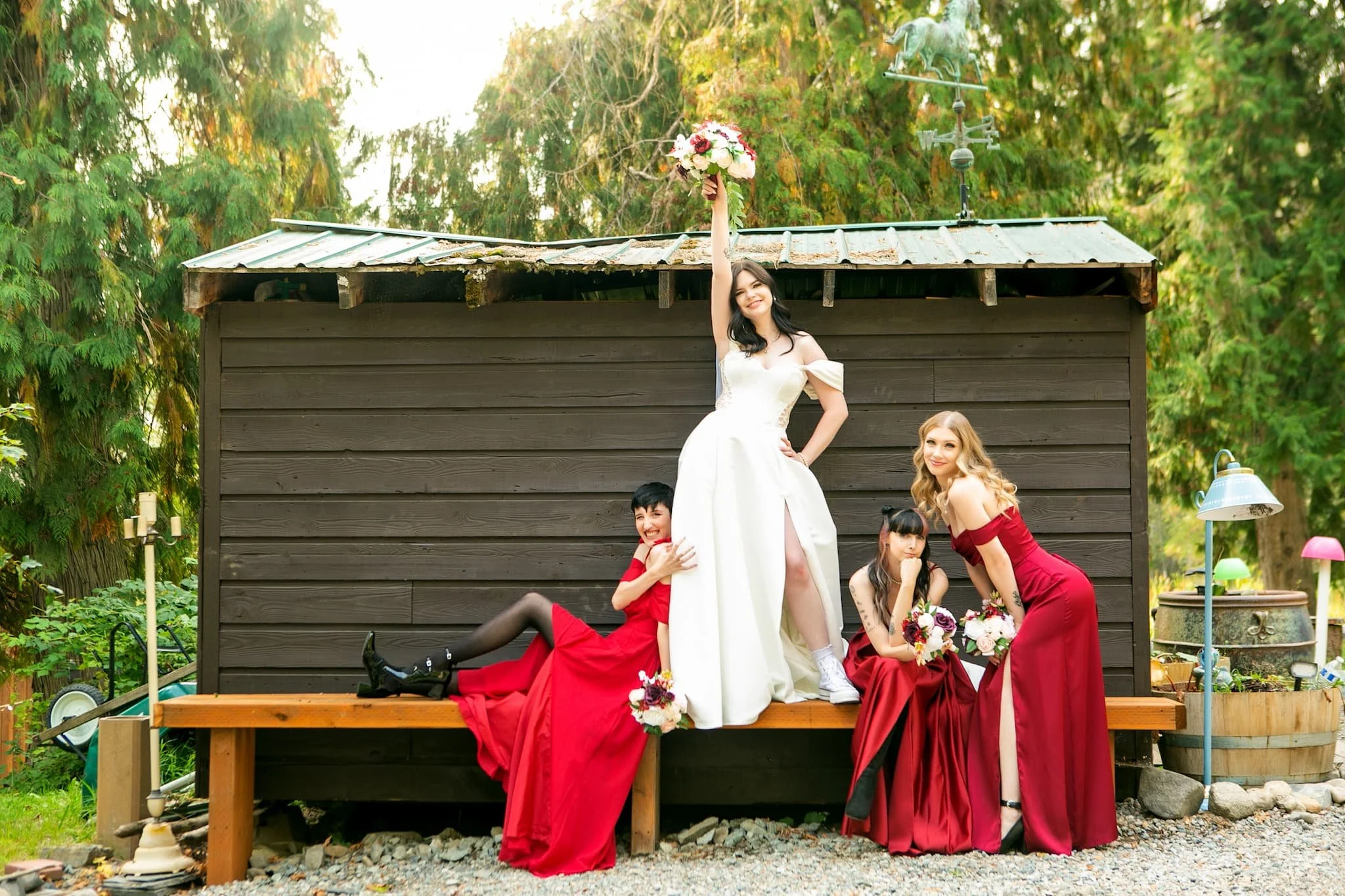 Funky bride and bridesmaid enjoying a nice shady spot at this bohemian wedding venue in Priest River
