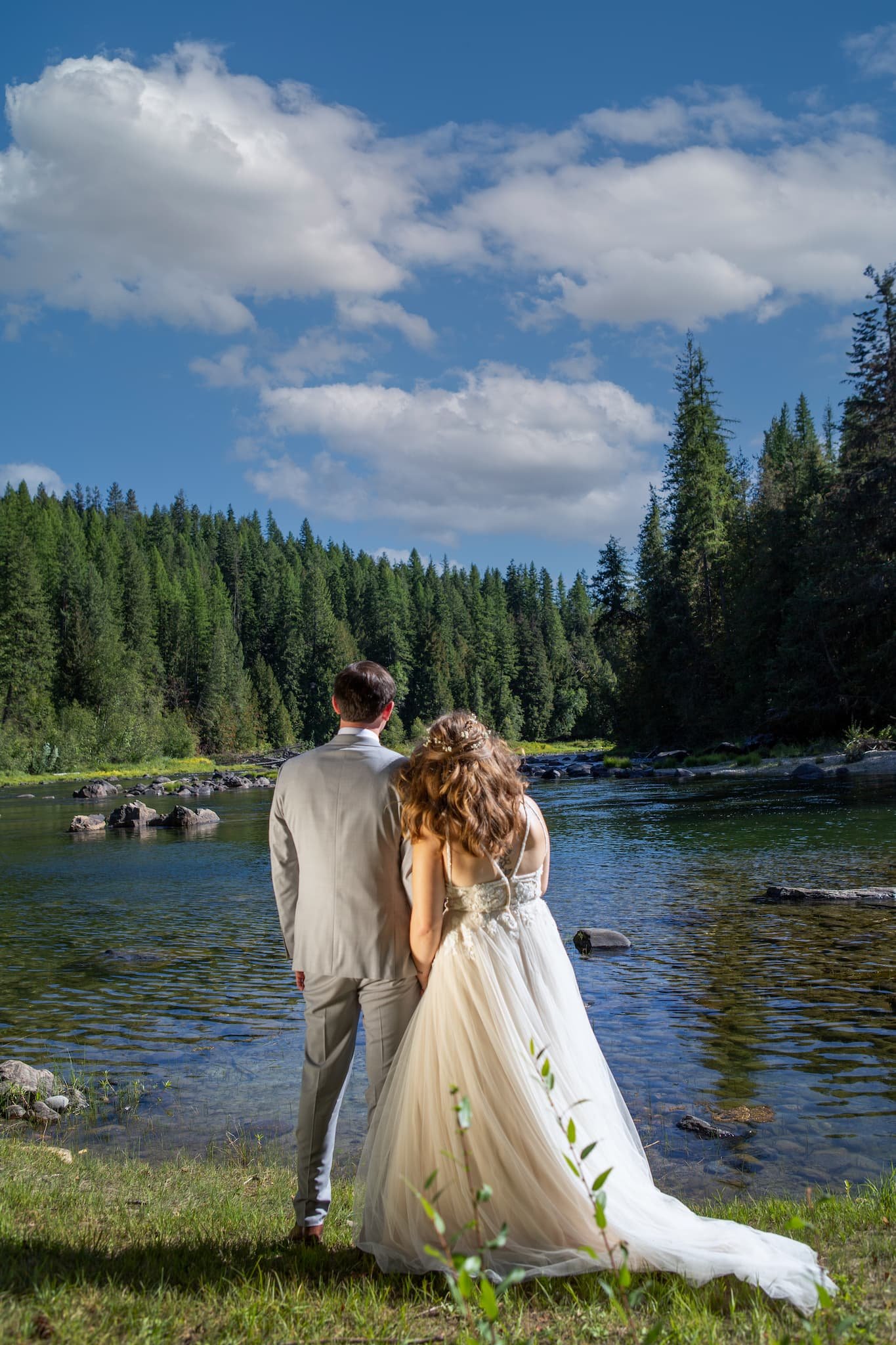 The river winds gently through our forested wedding venue in Priest River, Idaho, offering a serene, natural setting for outdoor ceremonies and celebrations.
