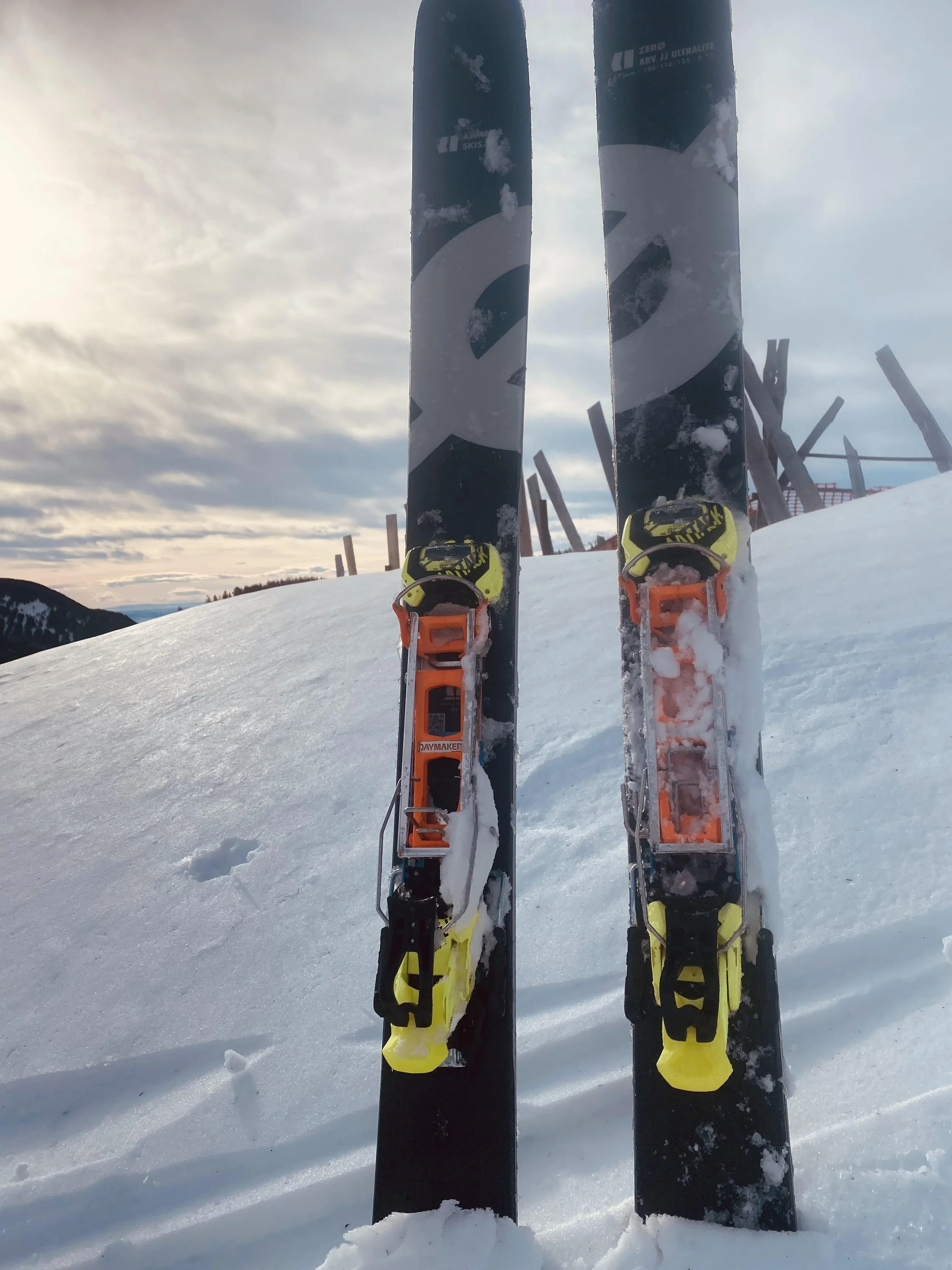 Skis in snow hill.jpg