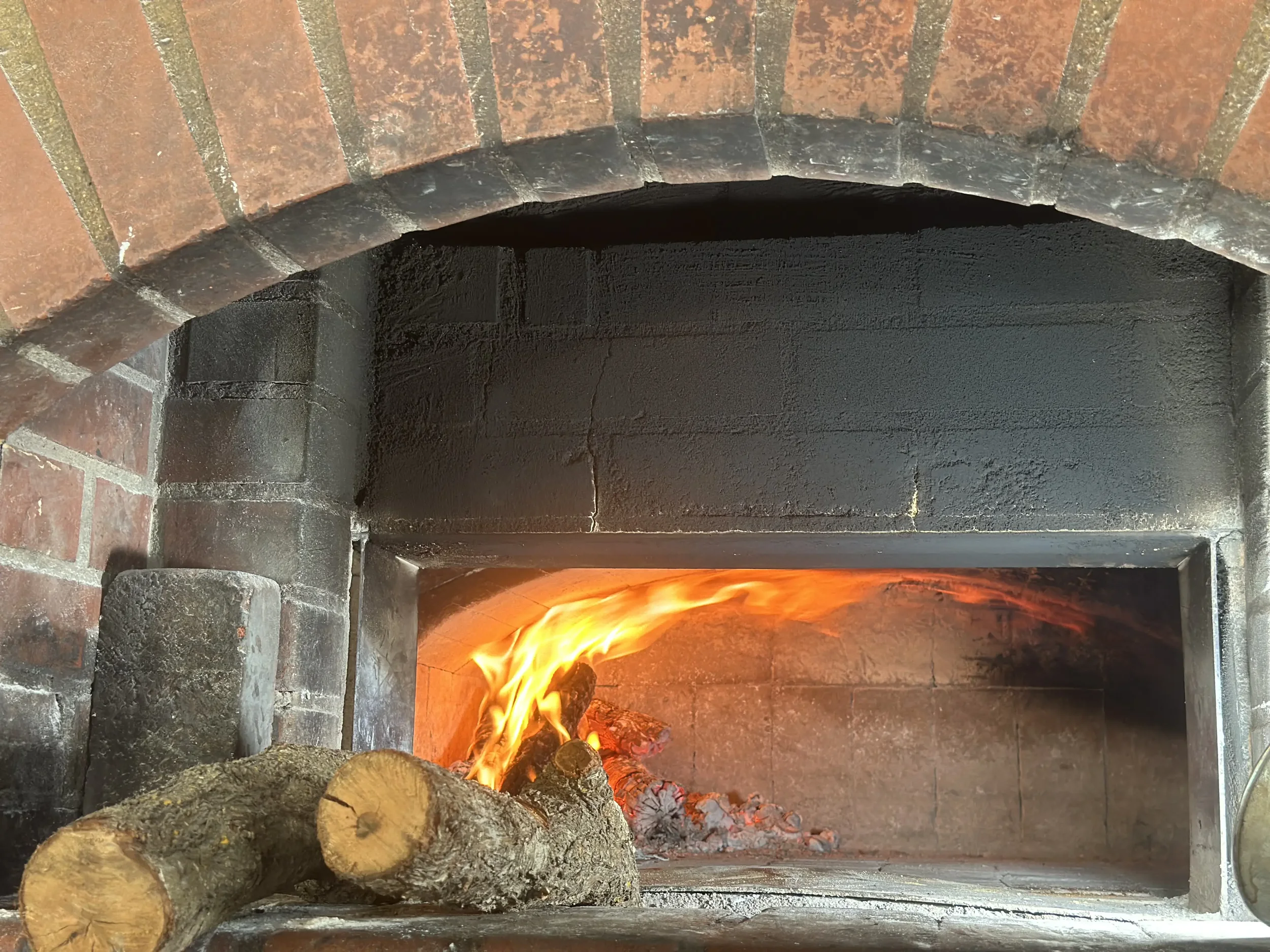 Wood-fired oven used for baking at Gold Coast Coffee and Bakery