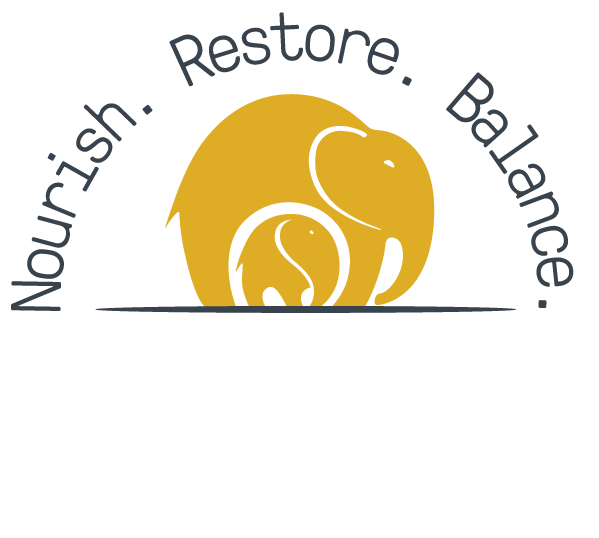 A logo featuring a gold-colored stylized whale with a black outline, above a black line, with the words "Nourish. Restore. Balance." in dark gray curved around the whale.