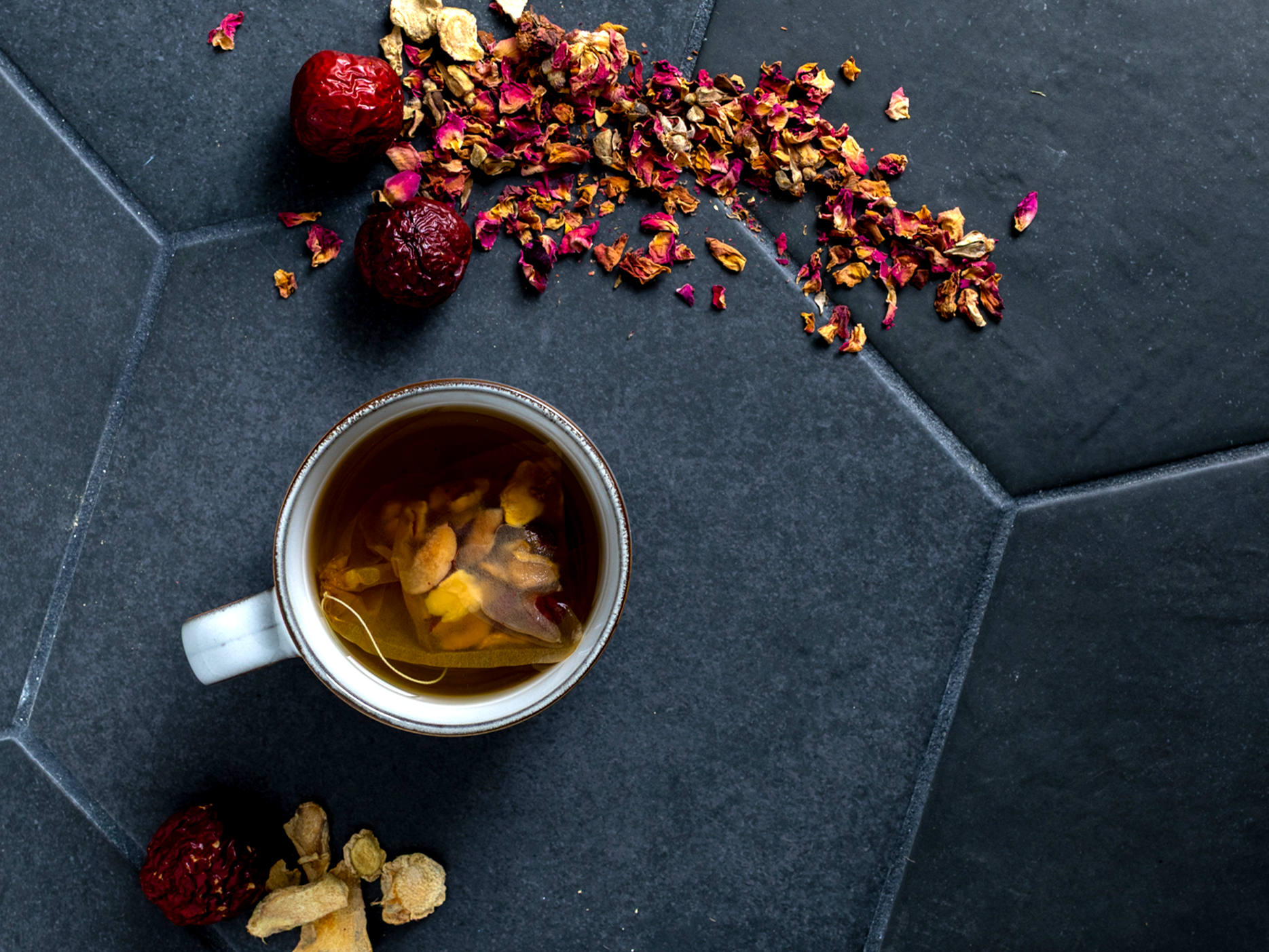 Repose tea in a cup with herbs.png