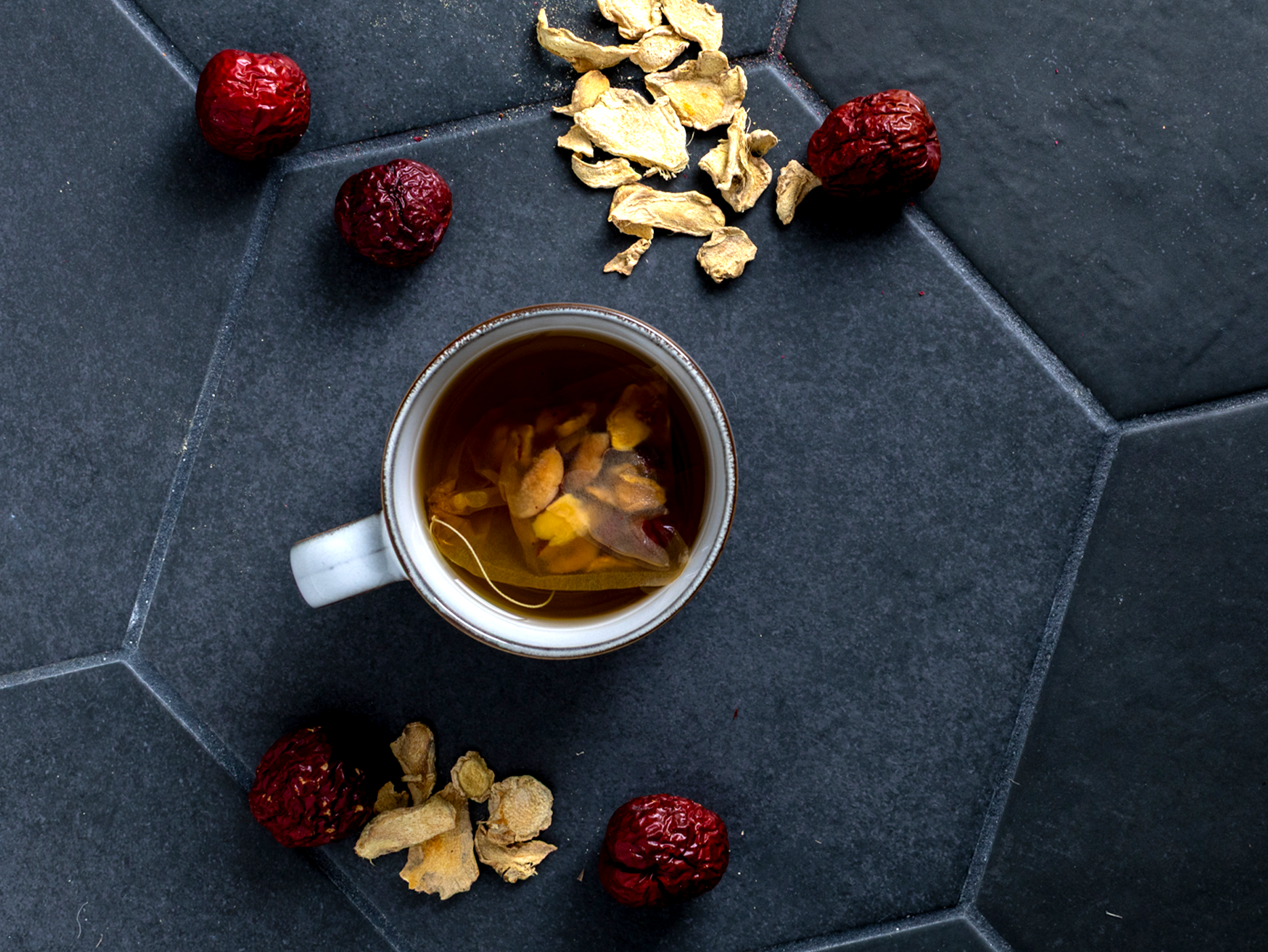 Revive tea in a cup with herbs.png