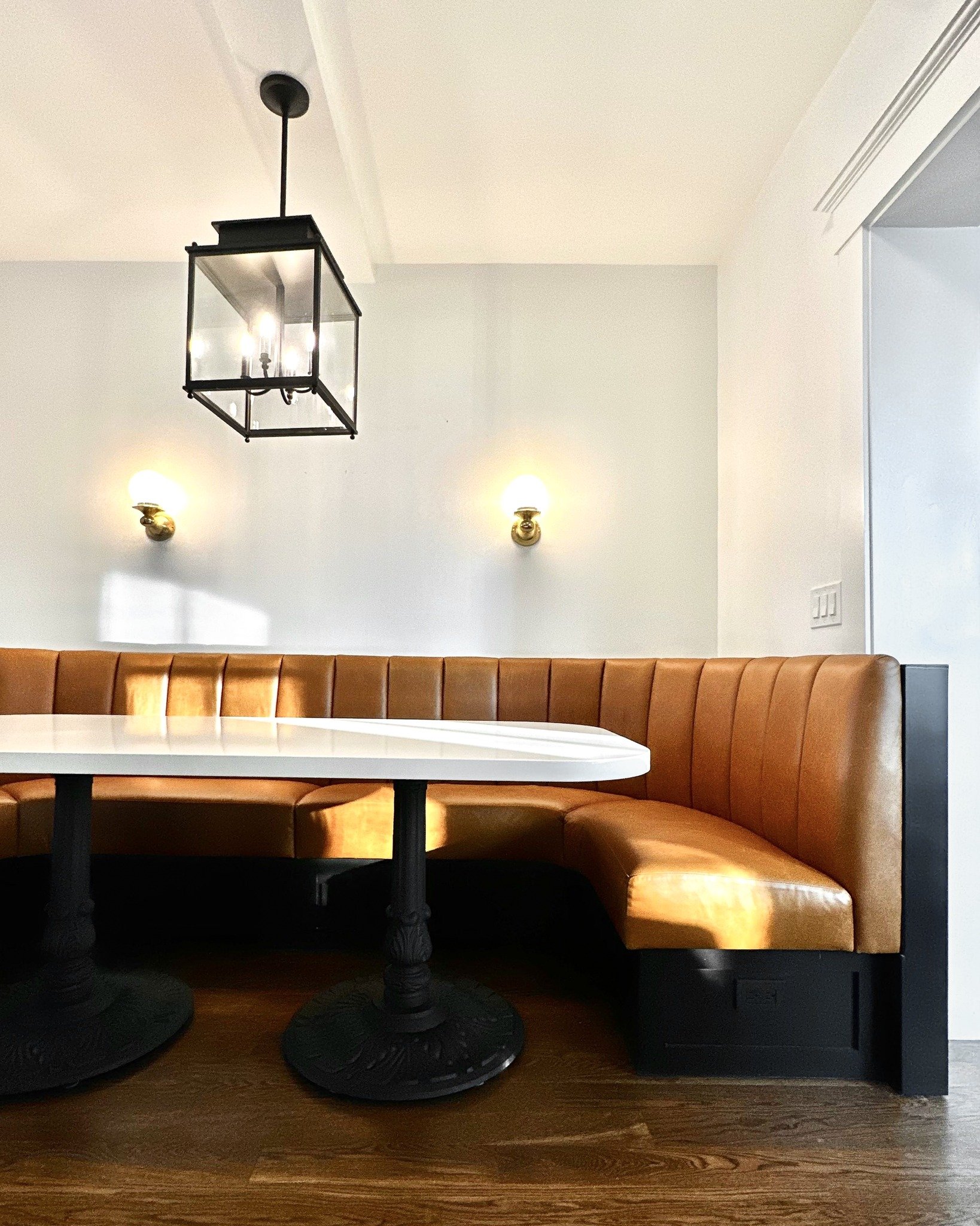 We recently built + installed this large stone-top table in a local residence - a perfect spot for holiday gatherings &amp; gingerbread parties... We're always glad to collaborate with @orangechaircstm, who made this epic banquette.