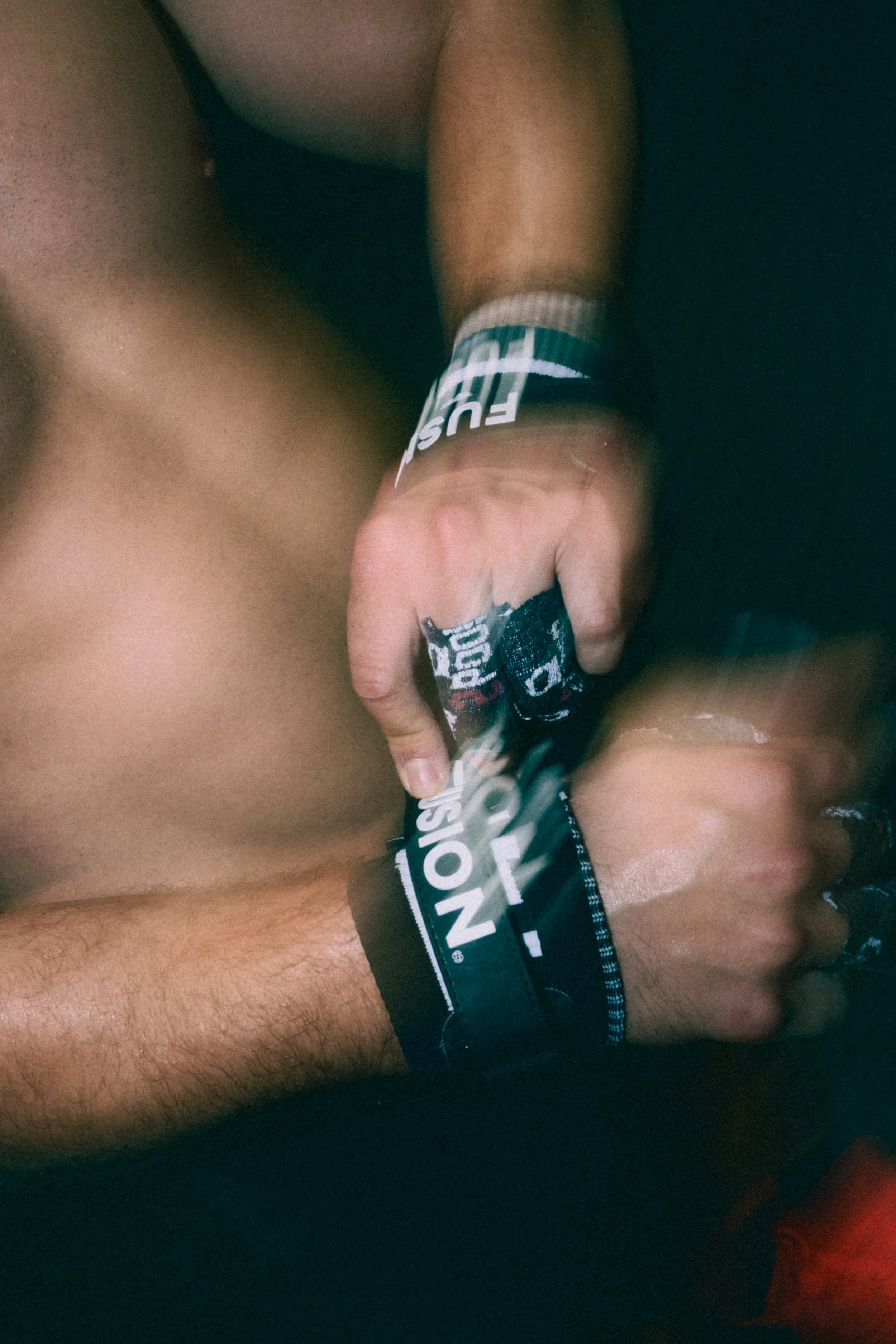 crossfit-athlete-wrist-wraps-closeup-gym-training-video.jpg
