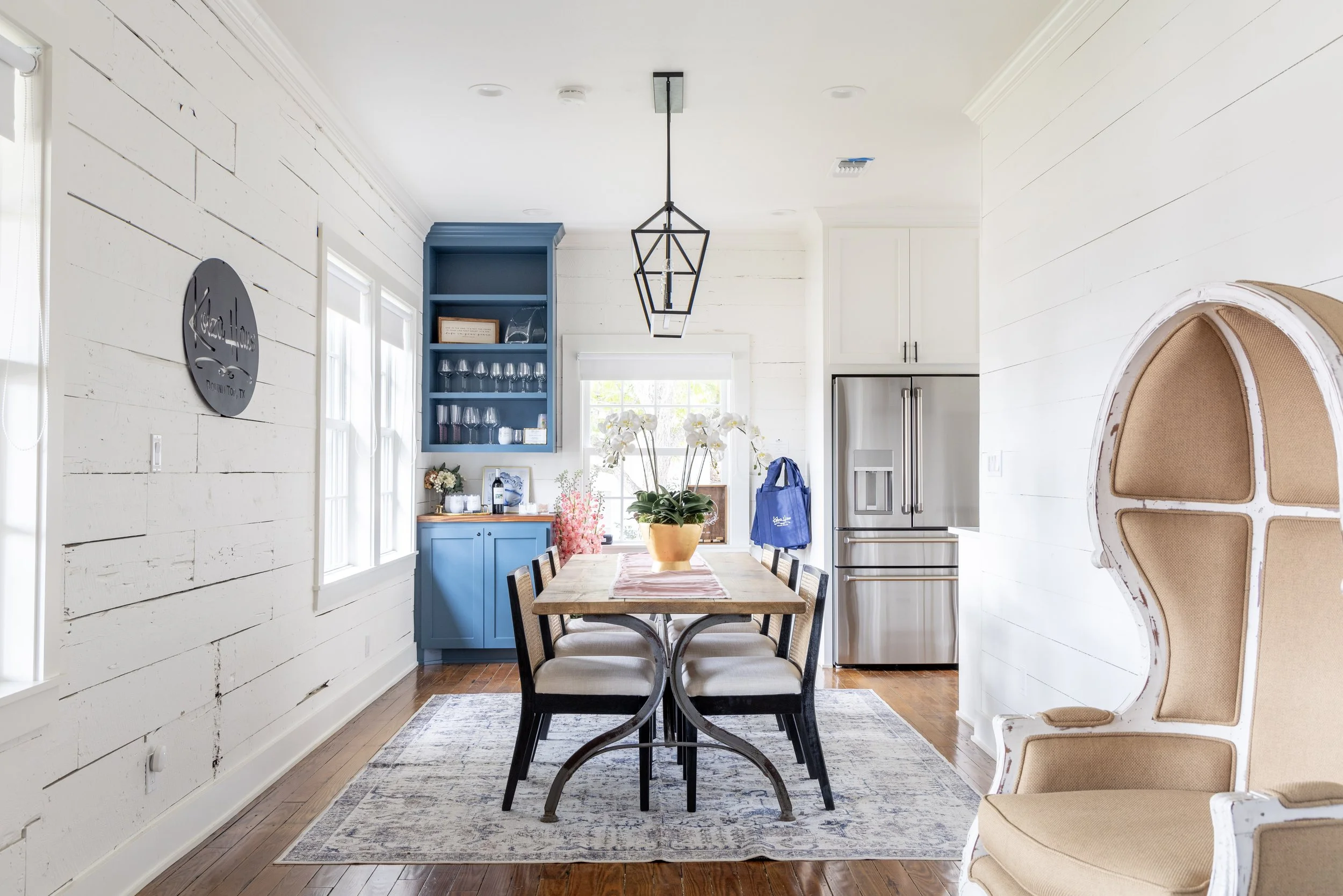 A spacious kitchen with dining table at the Kobza Haus in Round Top, Texas