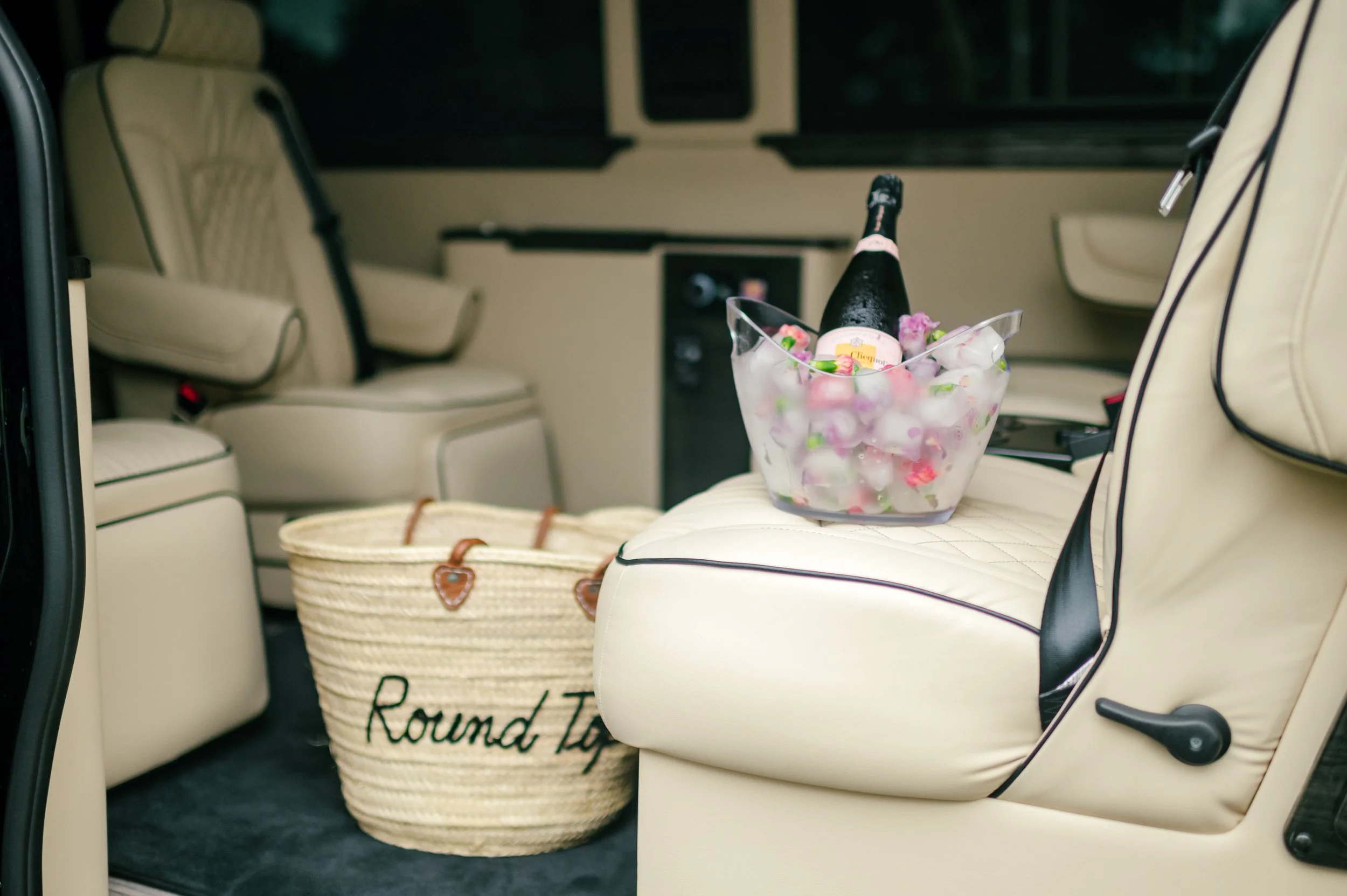hostie-concierge-champagne-sprinter-van-leather-interior.jpg