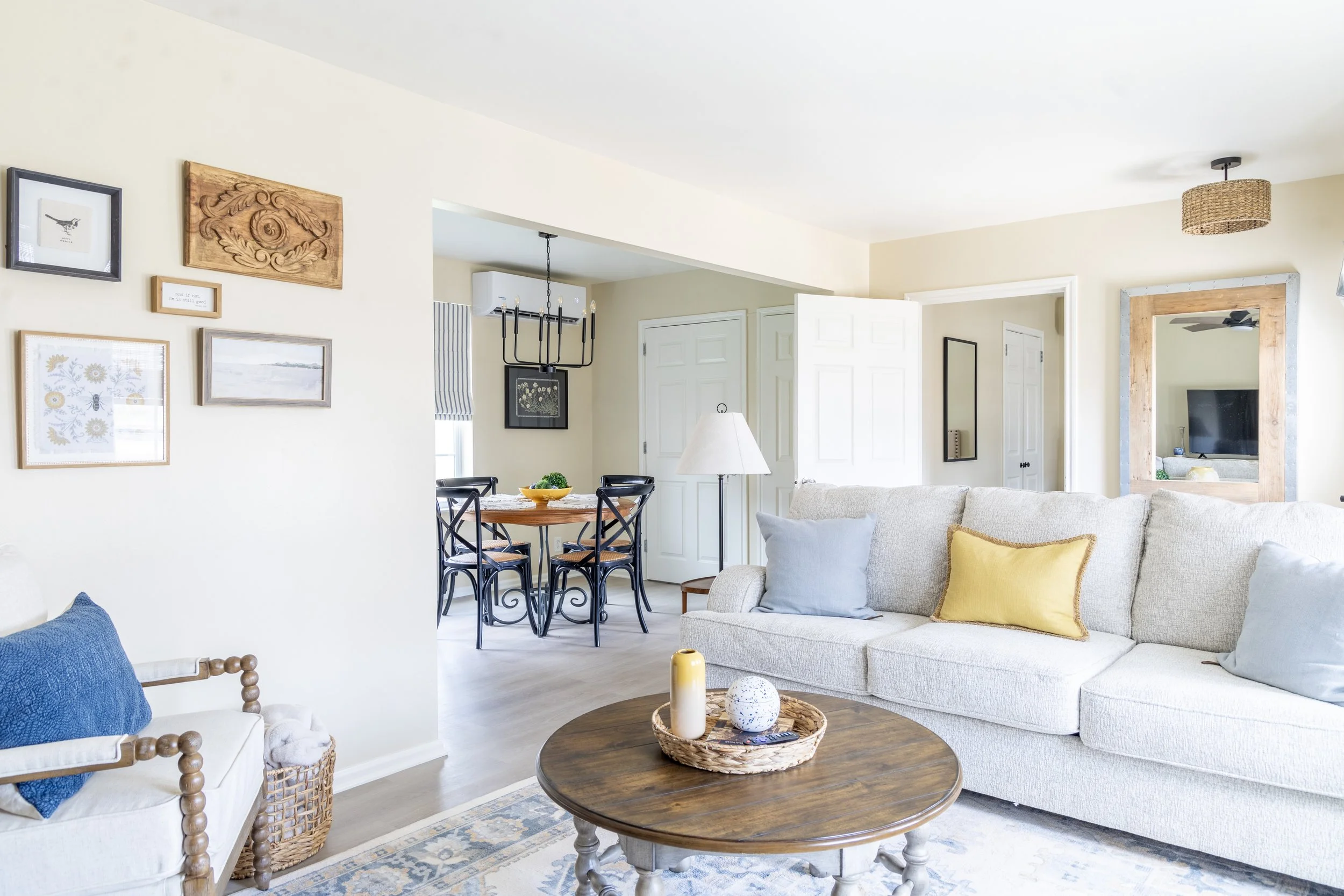 Cozy living and dining space at the Grace Inn Lucy cottage in La Grange, TX