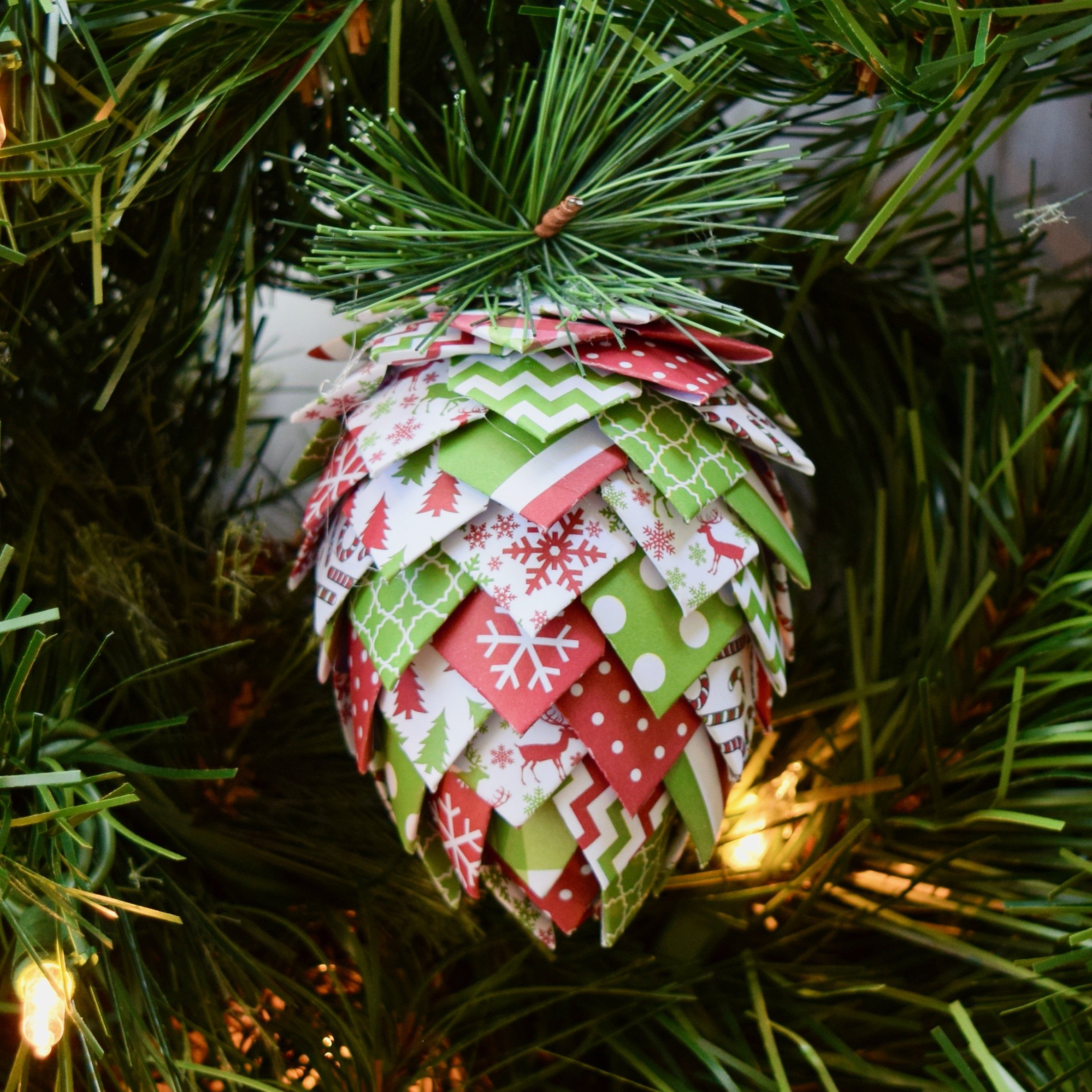 snowflakes red green pinecone.jpeg
