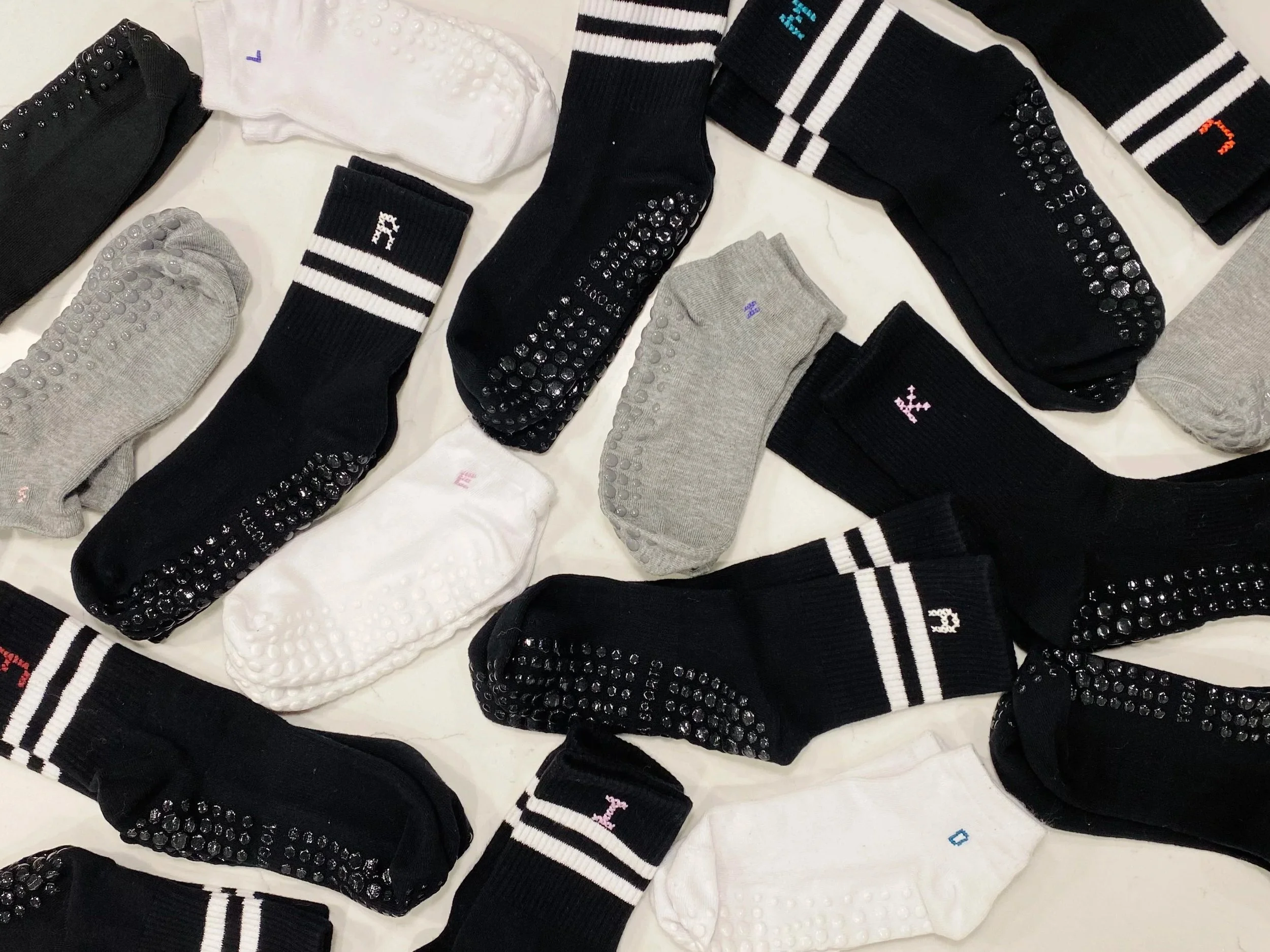 Embroidered Grip Socks at XCORE Pilates