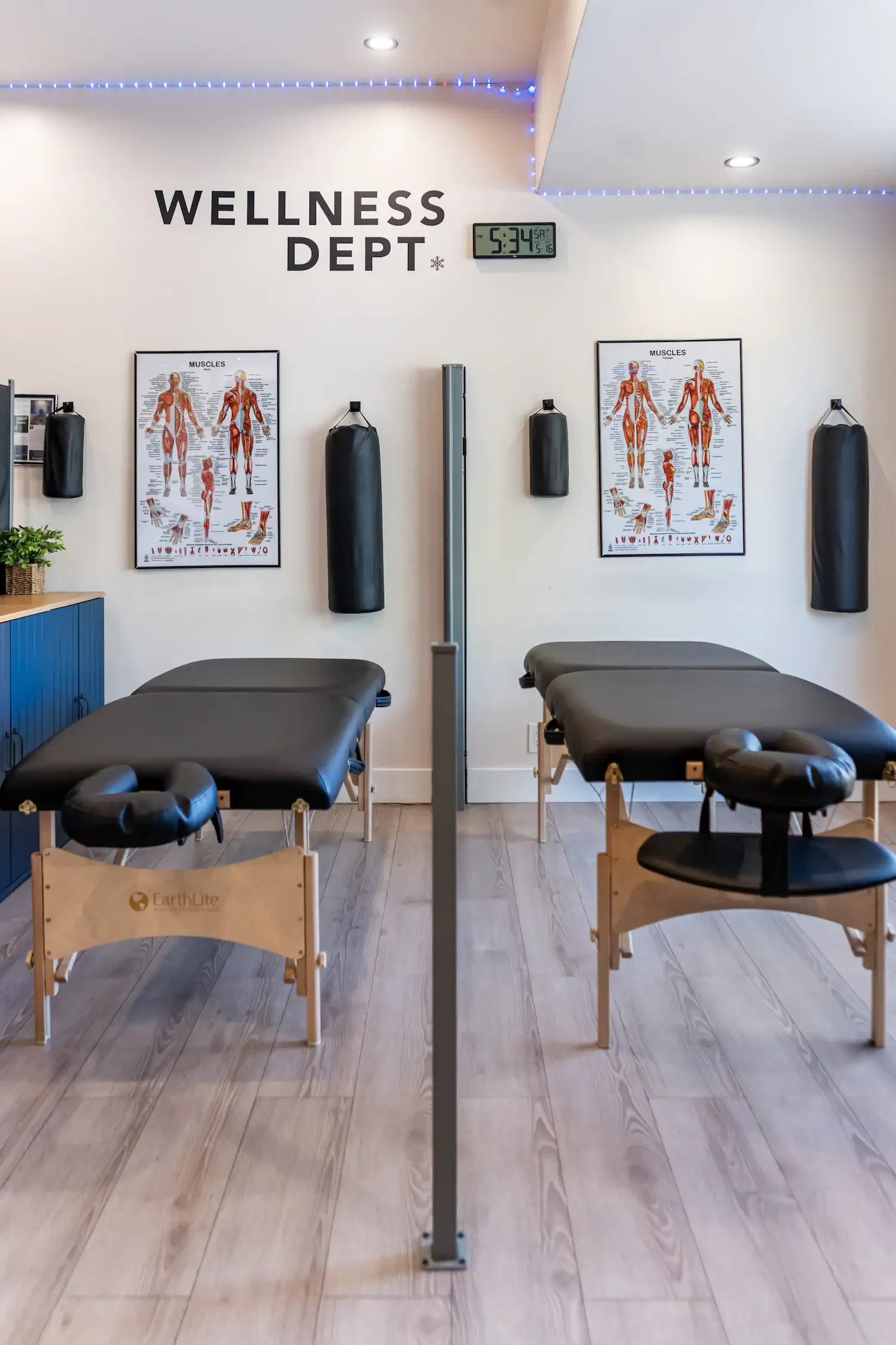 Wellness Dept myofascial release room with two treatment tables at Biohack Cryo & Wellness