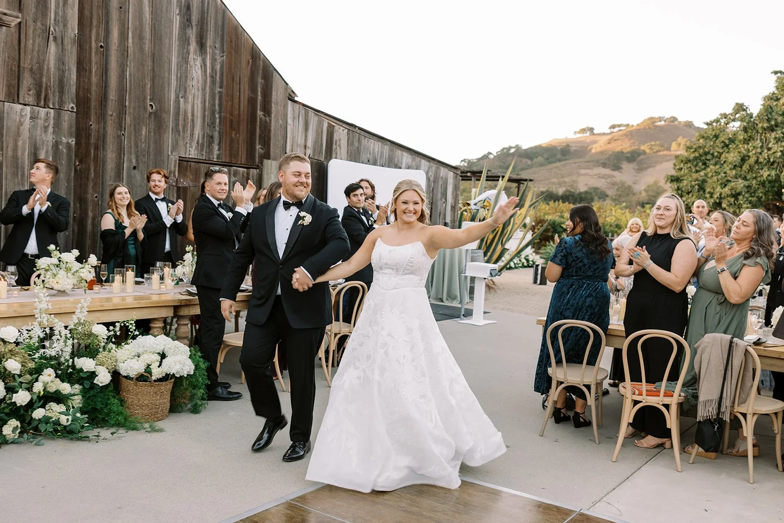 Couple enters reception at Higuera Ranch in San Luis Obispo, California