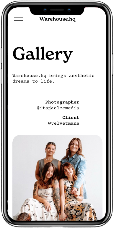 A smartphone displaying a gallery webpage from Warehouse.hq with a photo of four women posing together in dresses.