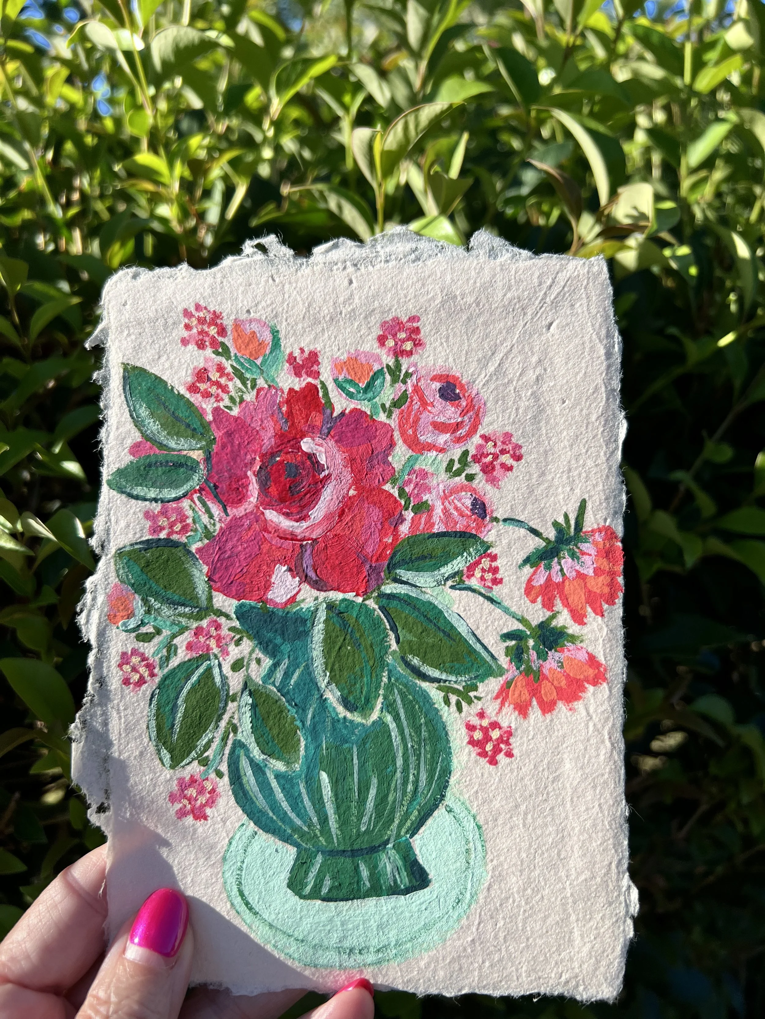 Original acryla gouache painting on handmade paper featuring a floral still life of pink and red roses.
