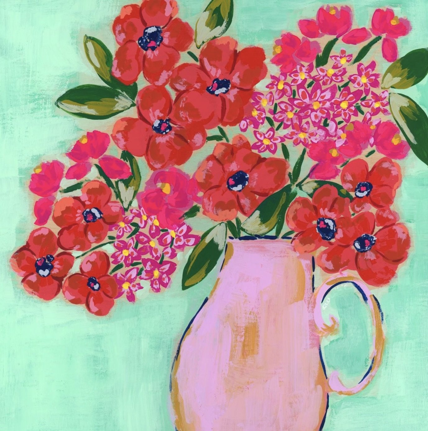 A stunning arrangement featuring bright red blooms and delicate hot pink florals. Round pink vase with handle. Monochromatic bouquet against soft mint background.
