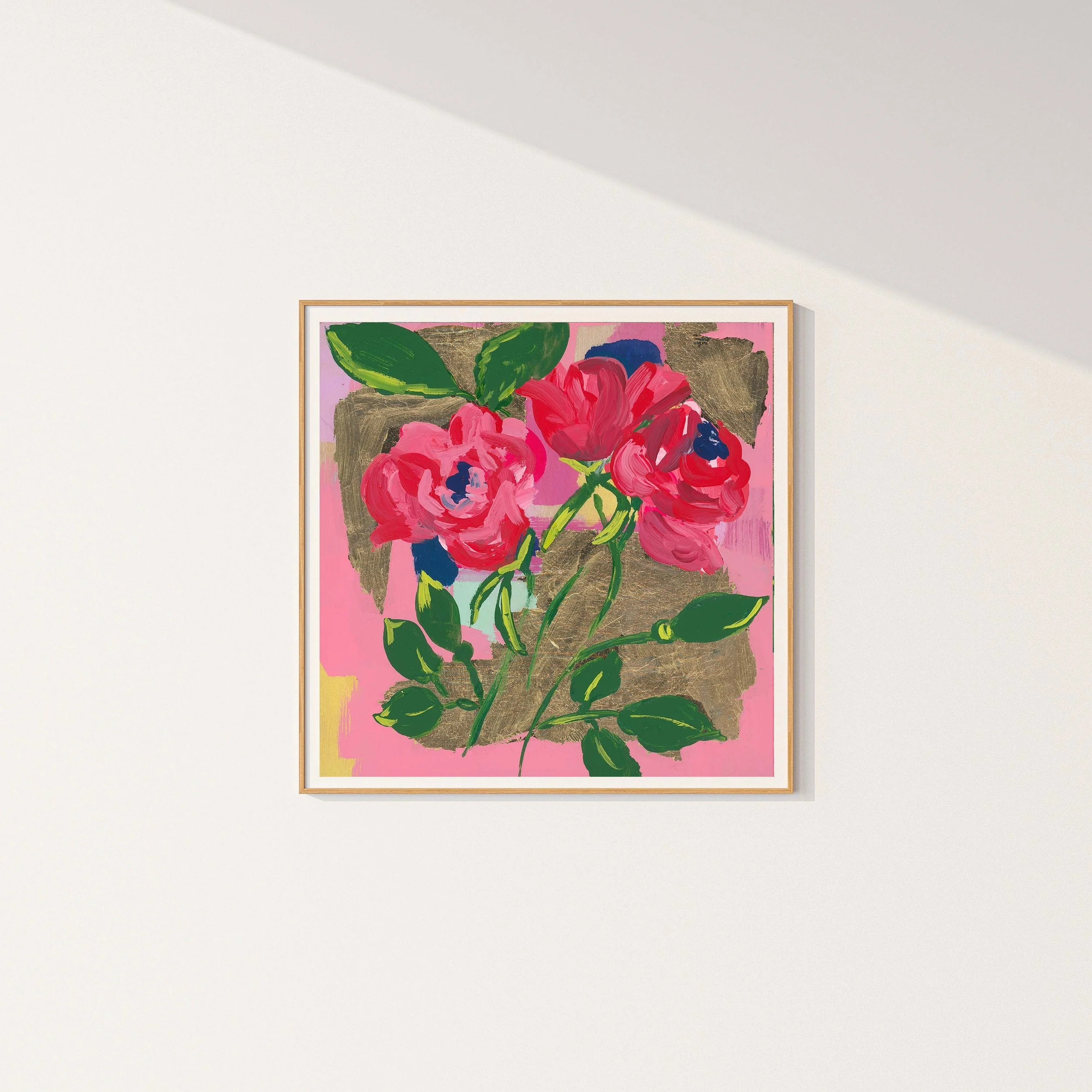 Fine art giclΓ©e print of a large red-pink rose flower and bud with dark blue center, accompanied by green foliage against gold leafing and pink abstract background.