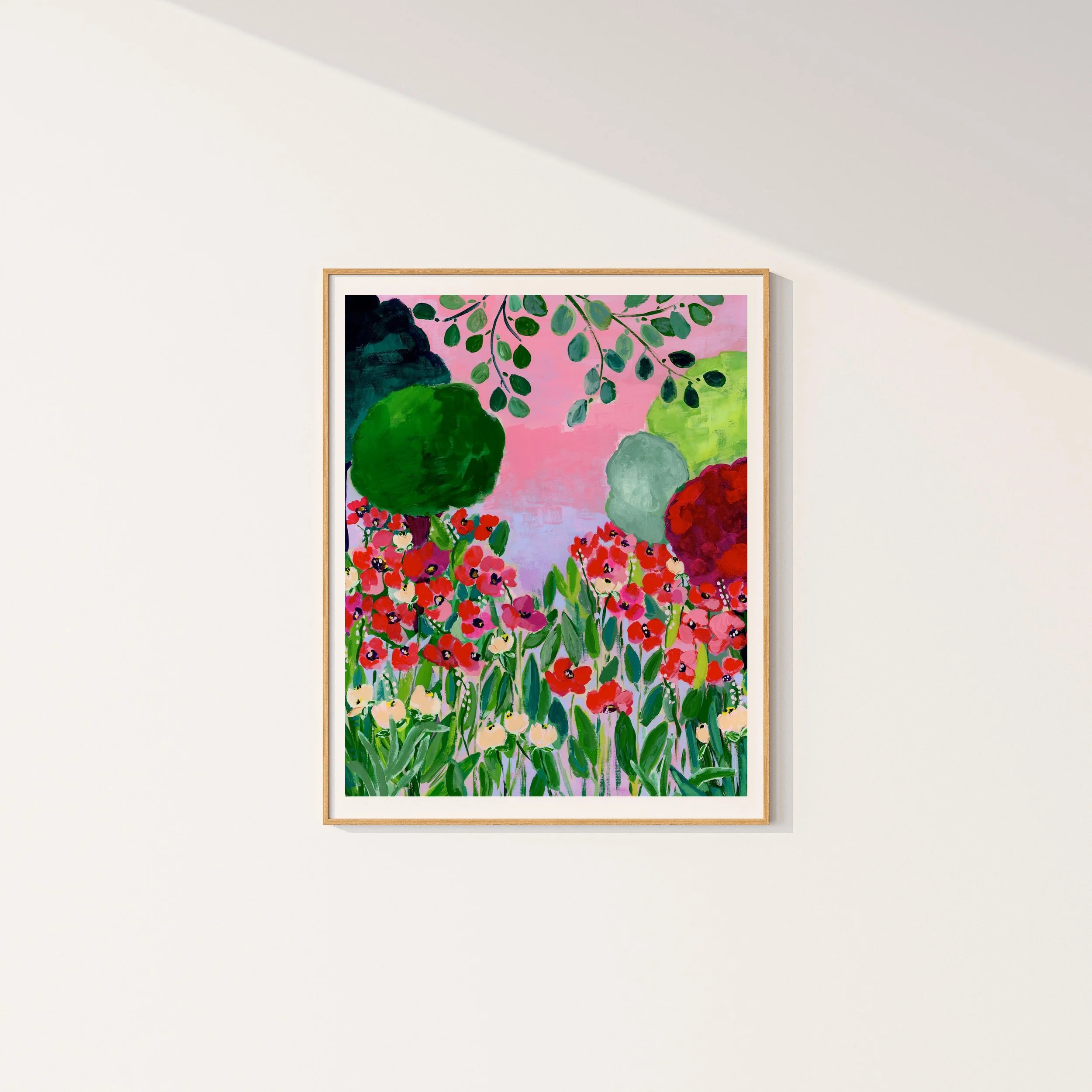Vibrant art print capturing the enchanting beauty of Claude Monet's garden in Giverny, where brilliant red poppies bloom beneath graceful branches against a dreamy pink sky.