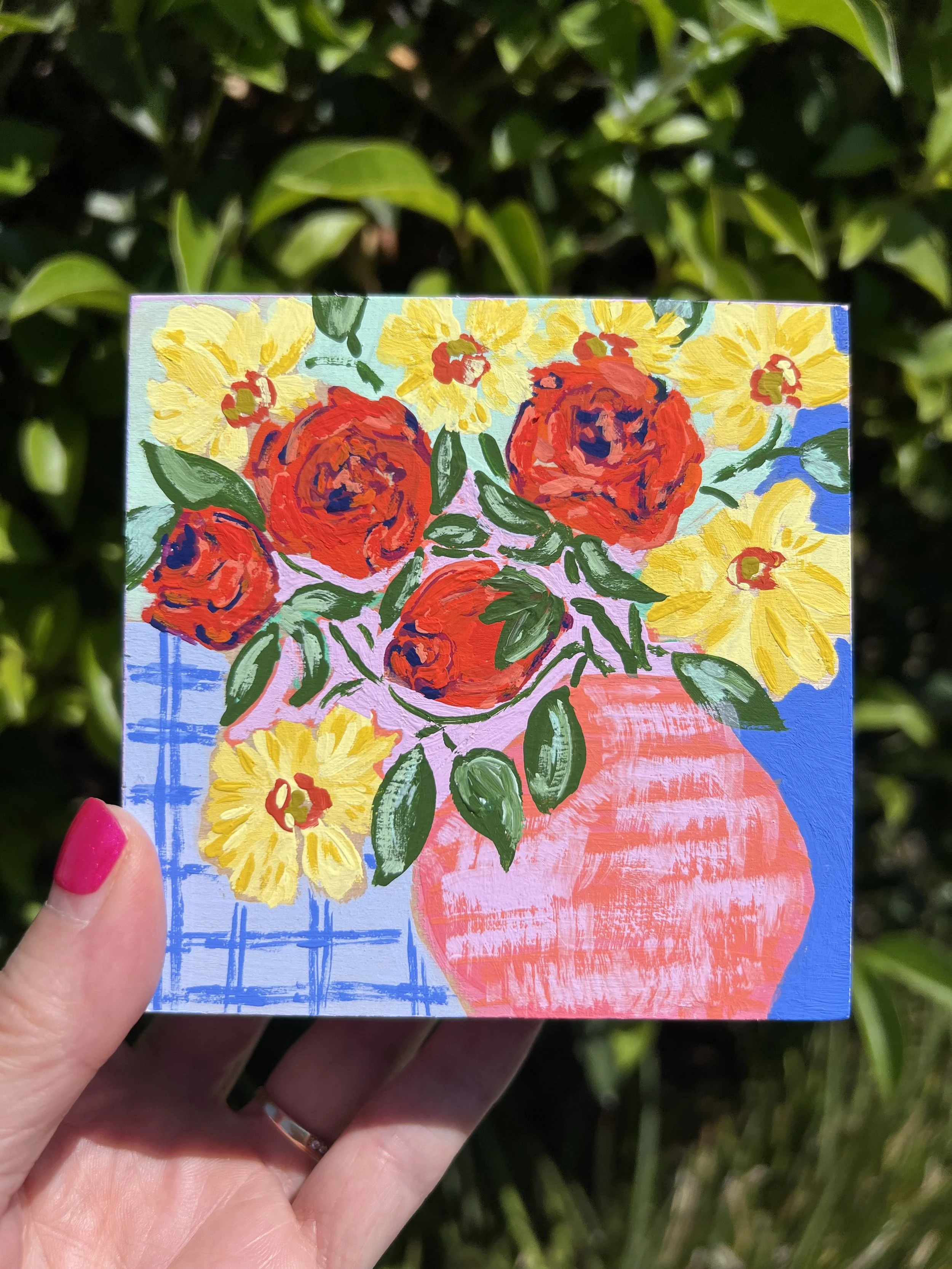 Original gouache painting of my weekly bouquet featuring bold orange roses and bright yellow ranunculus on an abstract and colorful background.