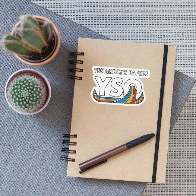 Die-cut vinyl band sticker featuring the Yesterdays Papers 90s alternative rock logo with the bold black outline inked edition design by Sketch Simply.
