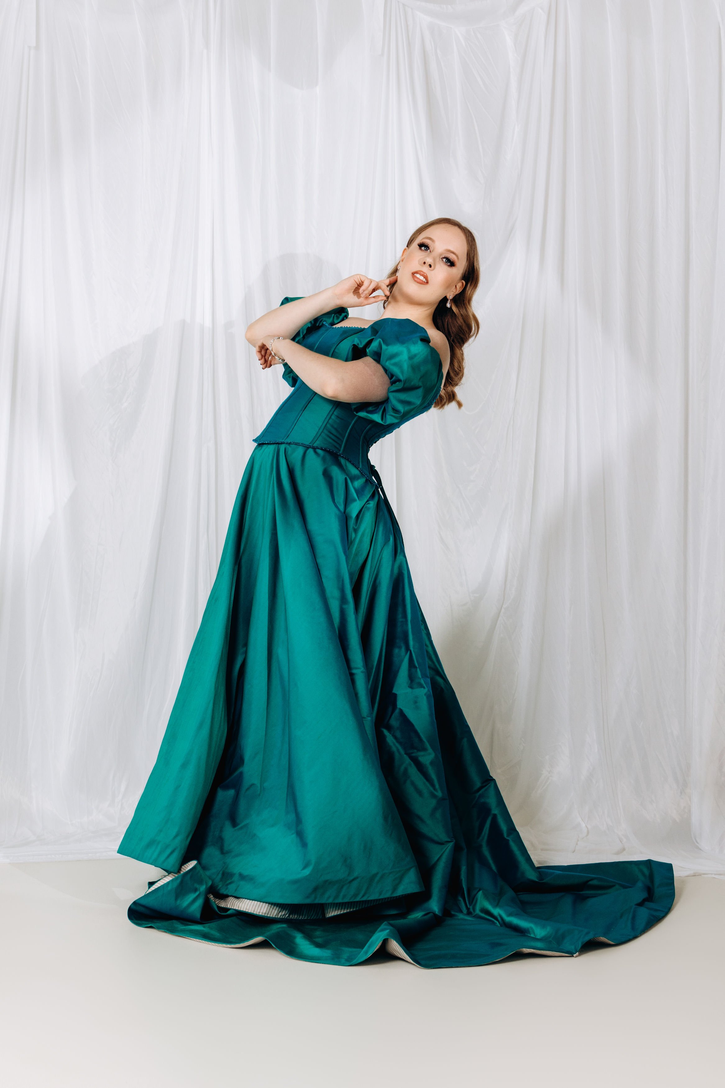 Photographer: Jana Johnston, The Anti Studio
Wearing: Galleria Couture