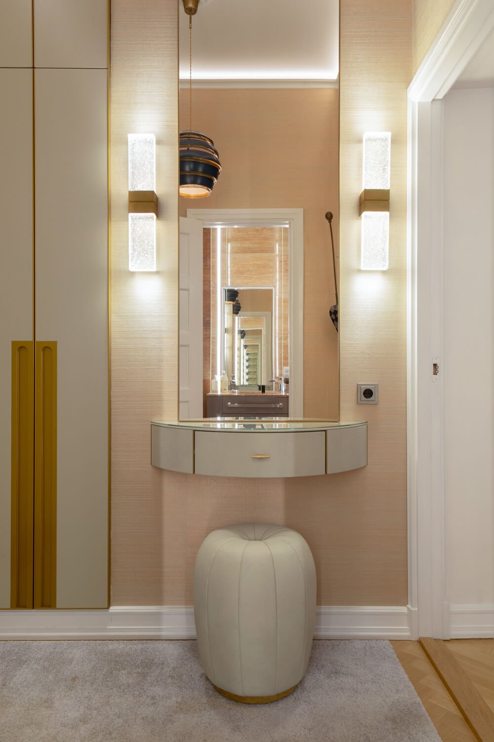 Elevate your entryway with the Collina pouf ottoman, a sleek design by Carola Rytsölä that merges form and function, offering a convenient spot to sit while saving space.