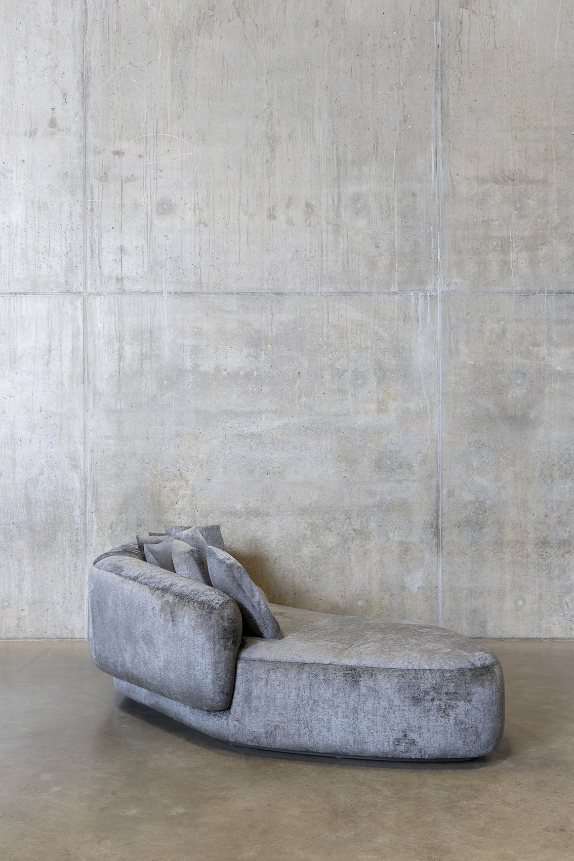 Attilio sofa, crafted by Carola Rytsölä as part of the Fleming Collection, embodies spontaneity and character, making it the perfect centerpiece for any room.