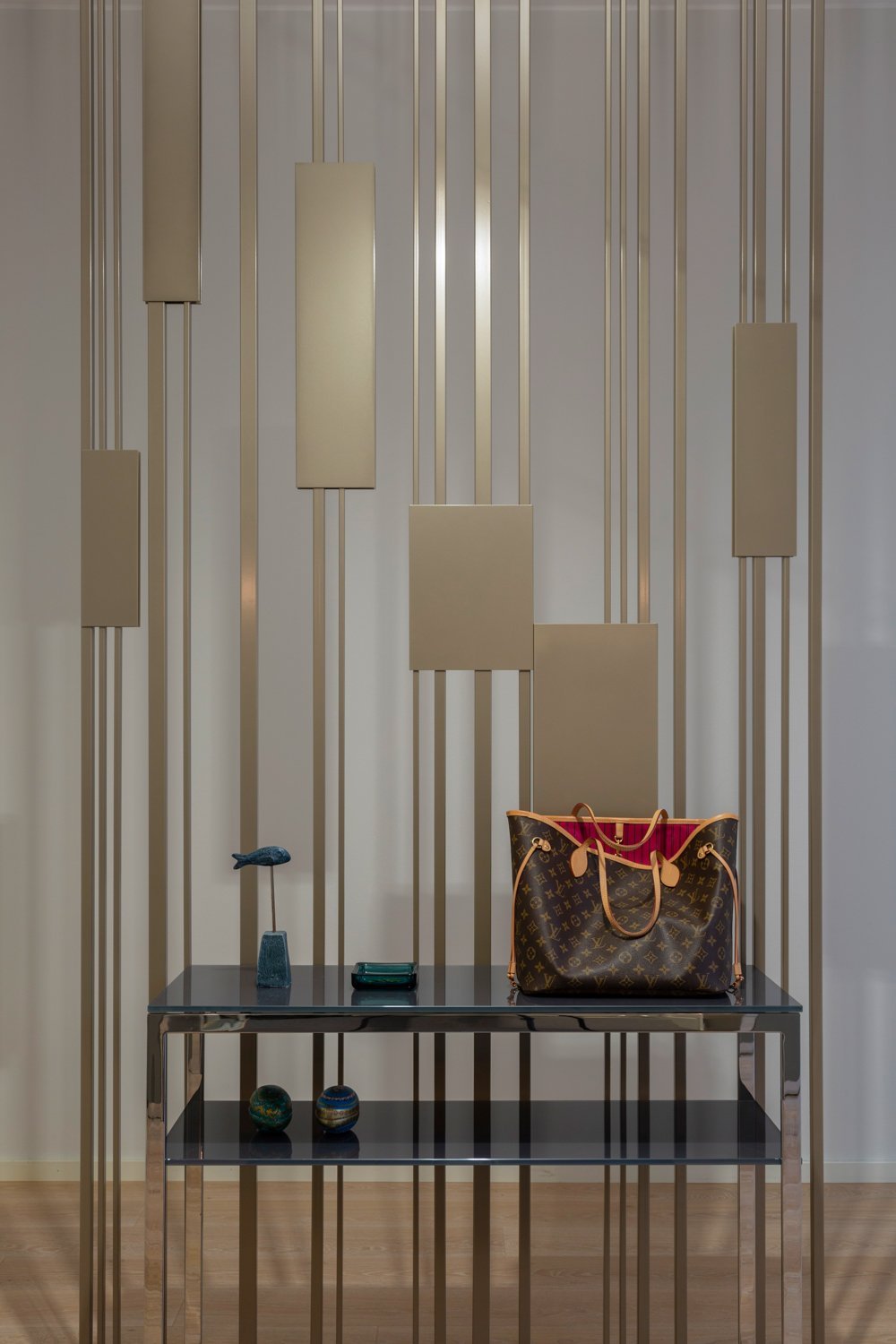 The Colonna space divider by Carola Rytsölä artfully balances elegance and functionality, transforming your environment with its slender lines from the Fleming Collection.