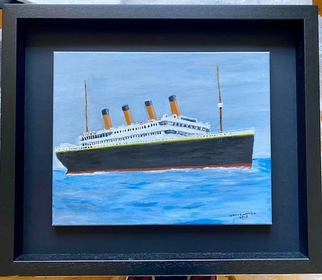 Painting of the RMS Titanic in ocean, with four smokestacks, framed in a black matte and black frame.
